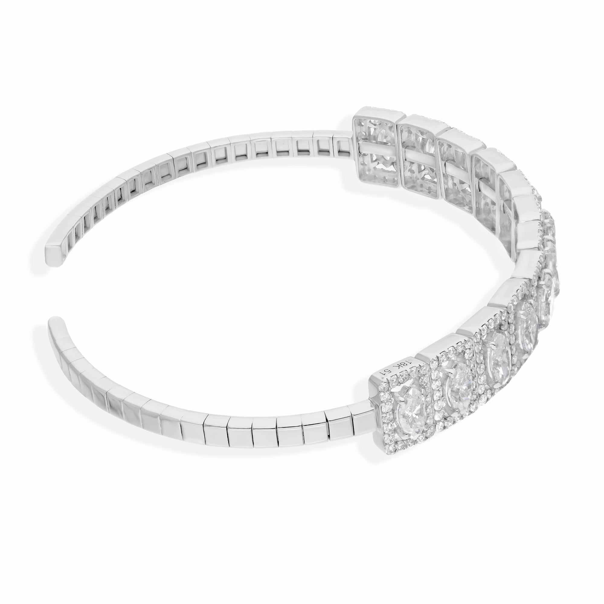 Cast from 18-karat gold, these exquisite bangle is handset with 5.06 carats of sparkling diamonds.

FOLLOW SPECTRUM JEWELS storefront to view the latest collection & exclusive pieces. Spectrum Jewels is proudly rated as a Top Seller on 1stdibs with
