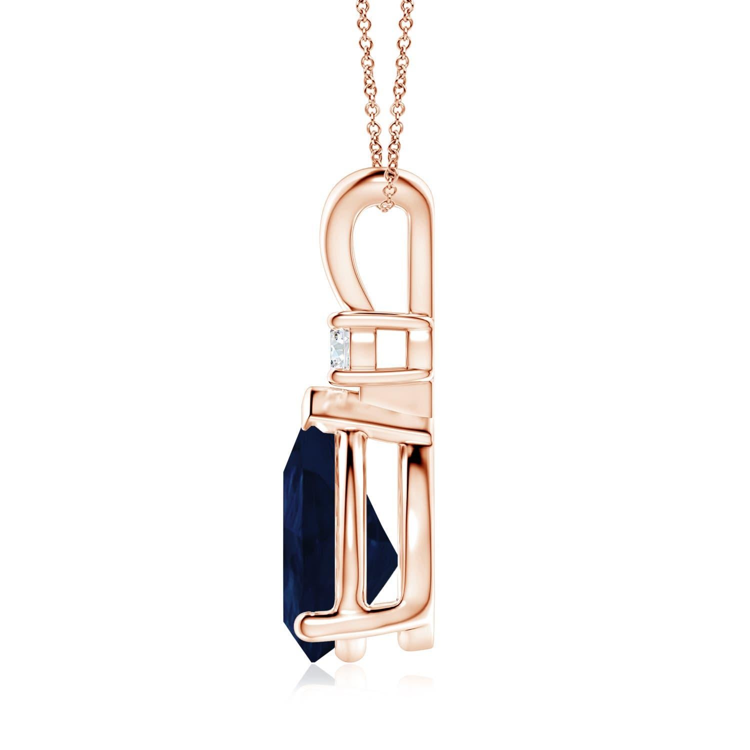 This classic solitaire pendant features a pear-shaped sapphire secured in a prong setting. A brilliant round diamond sits atop the blue gemstone adding to the design's charm. Simple yet appealing, this sapphire pendant in 14k rose gold is crafted