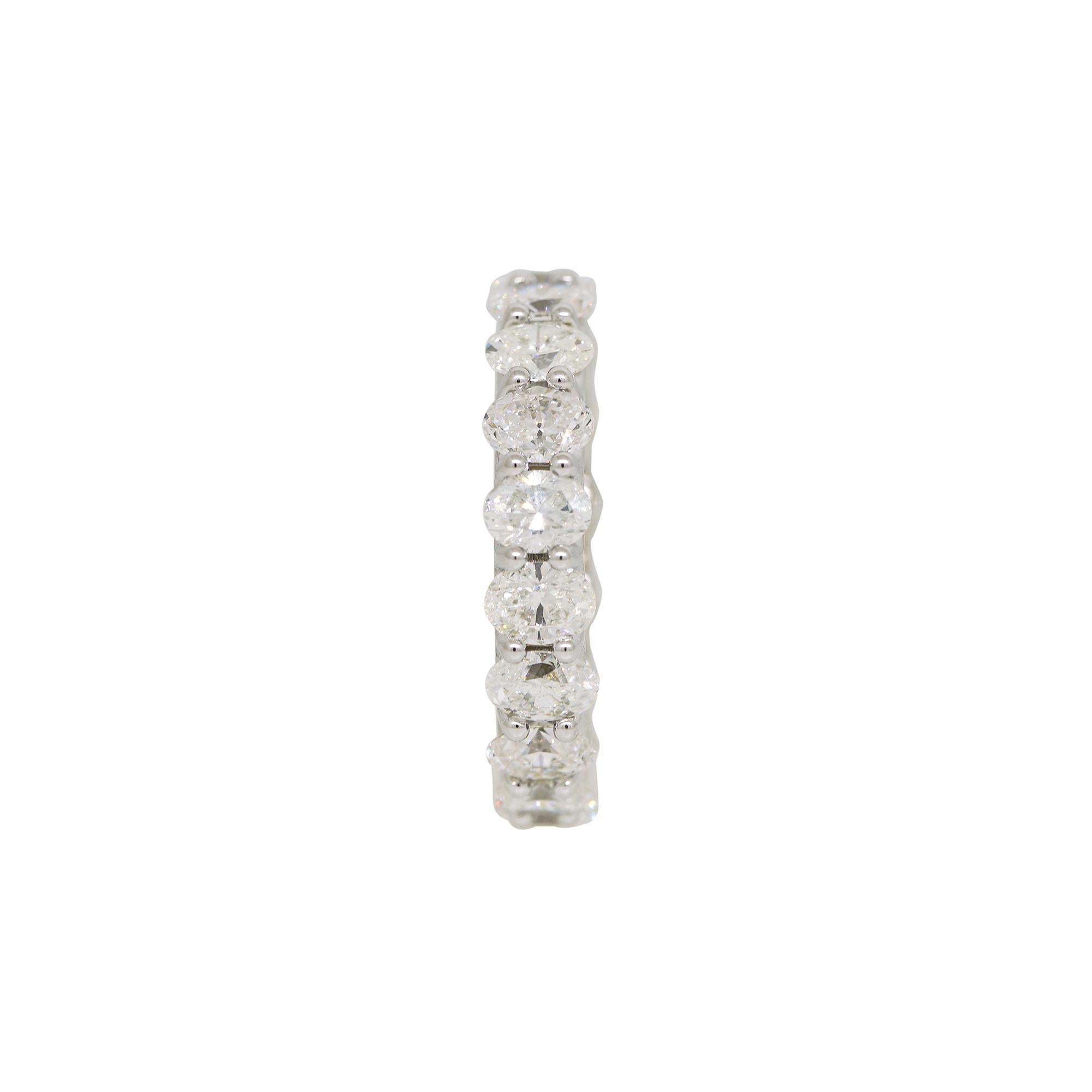 Natural 5.04 Carat Oval Cut Diamond 14-Karat Eternity Band 

This natural, oval-cut diamond eternity band/ring is a modern piece of jewelry that can be worn as a wedding band, stackable fashion ring, or both! The natural oval-cut diamonds are set in