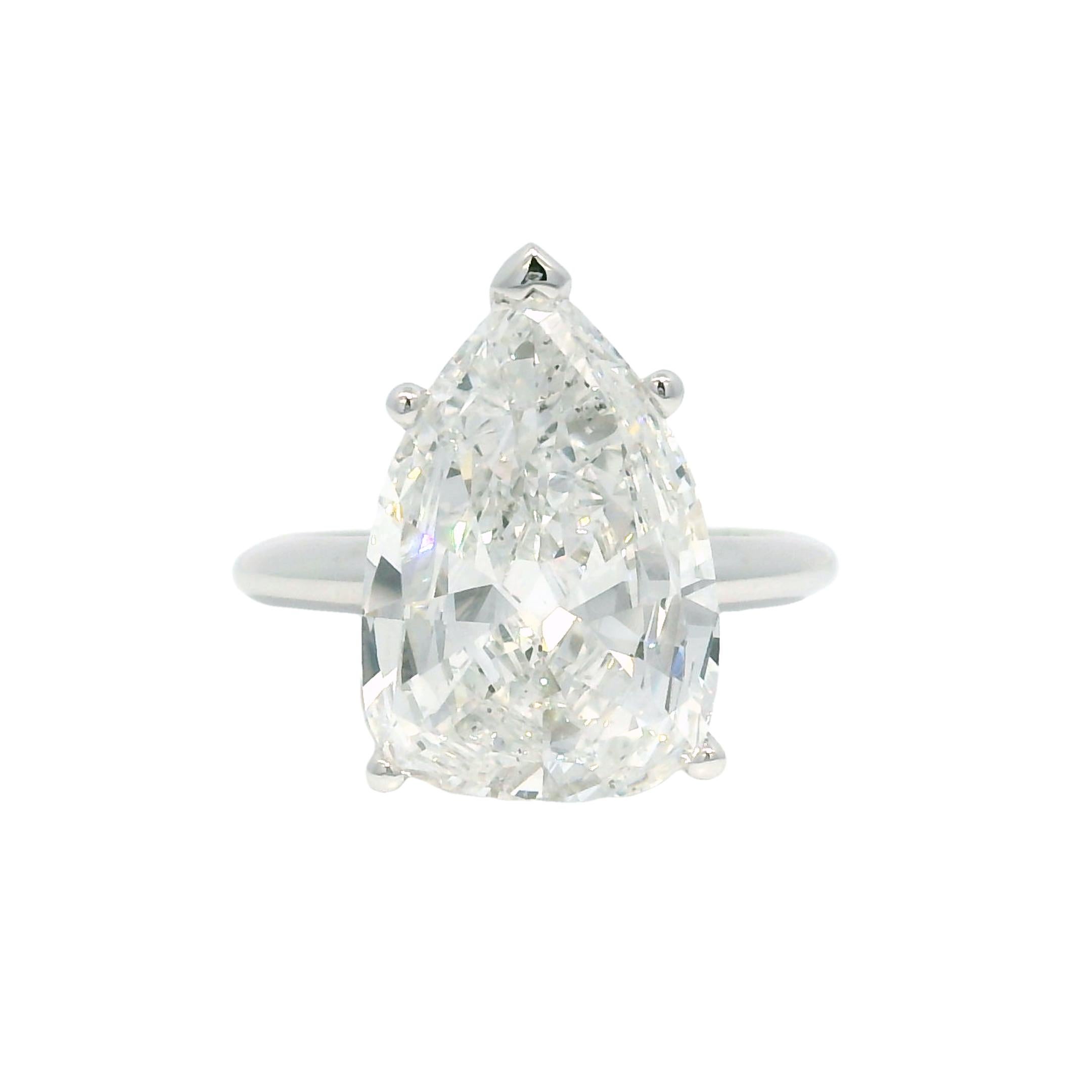 14k White Gold Natural 5.19 Carat Pear-Shape Diamond Engagement Ring

Style: Natural Pear Shape Diamond Ring
Material: 14k White Gold
Main Diamond Details: The main diamond is a natural, Pear shape diamond, weighing approximately 5.19 carats
