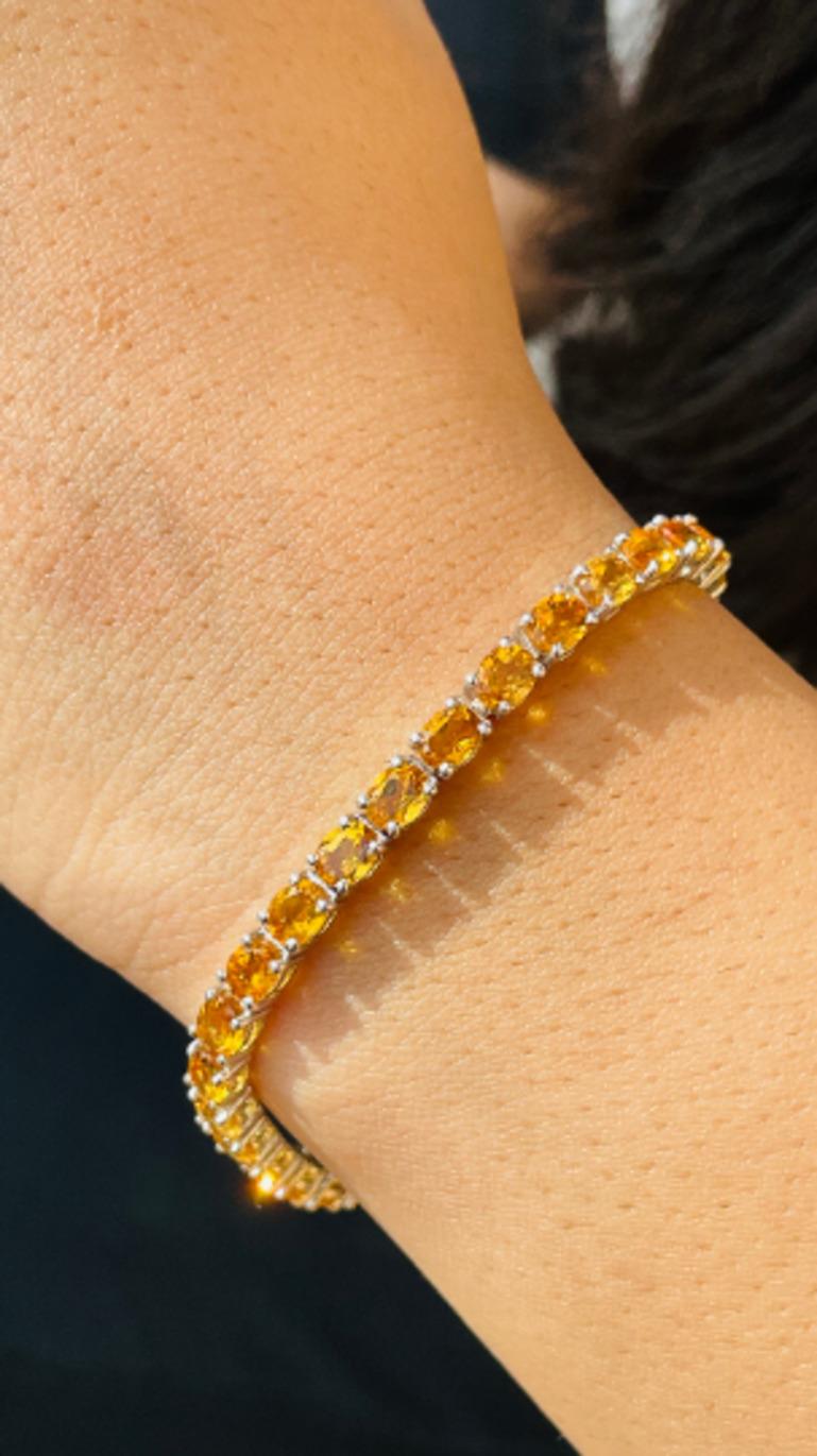 Natural 5.20 CT Citrine Gemstone Oval Cut Tennis Bracelet in sterling silver showcases endlessly sparkling natural cirtine, weighing 5.20 carat. It measures 6.5 inches long in length. 
Citrine stimulate concentration and reduces stress. 
Designed