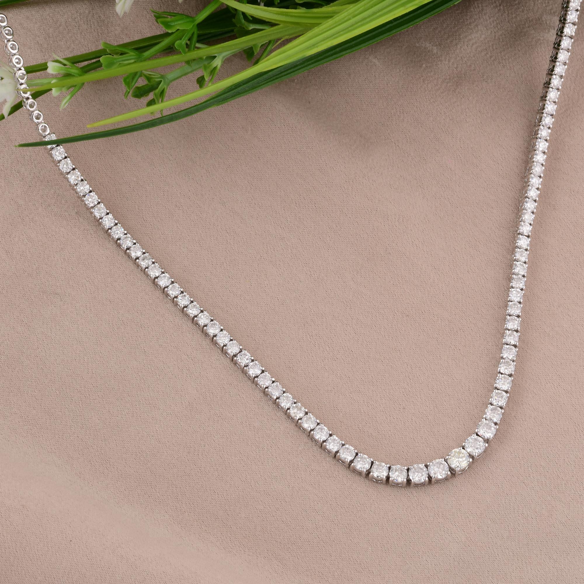 Each diamond is expertly set in a delicate chain crafted from luxurious 18 Karat White Gold, creating a seamless and fluid design that drapes gracefully around the neck. The polished gold enhances the brilliance of the diamonds while providing a