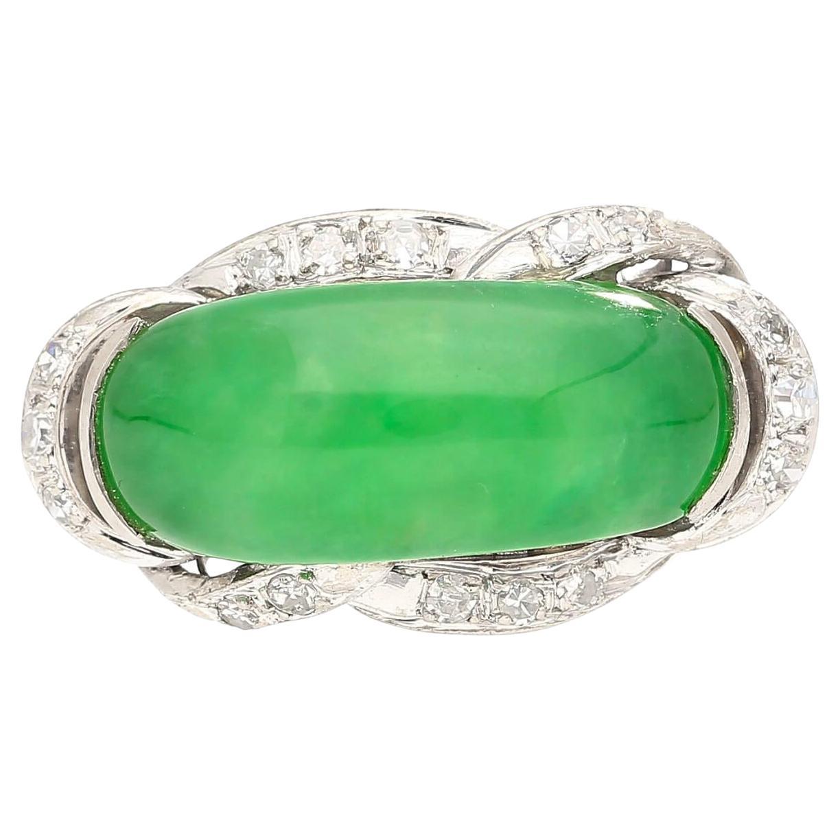 Natural Jade & Diamond in 18K White Gold Ring.

This ring features a natural, bright green grade 