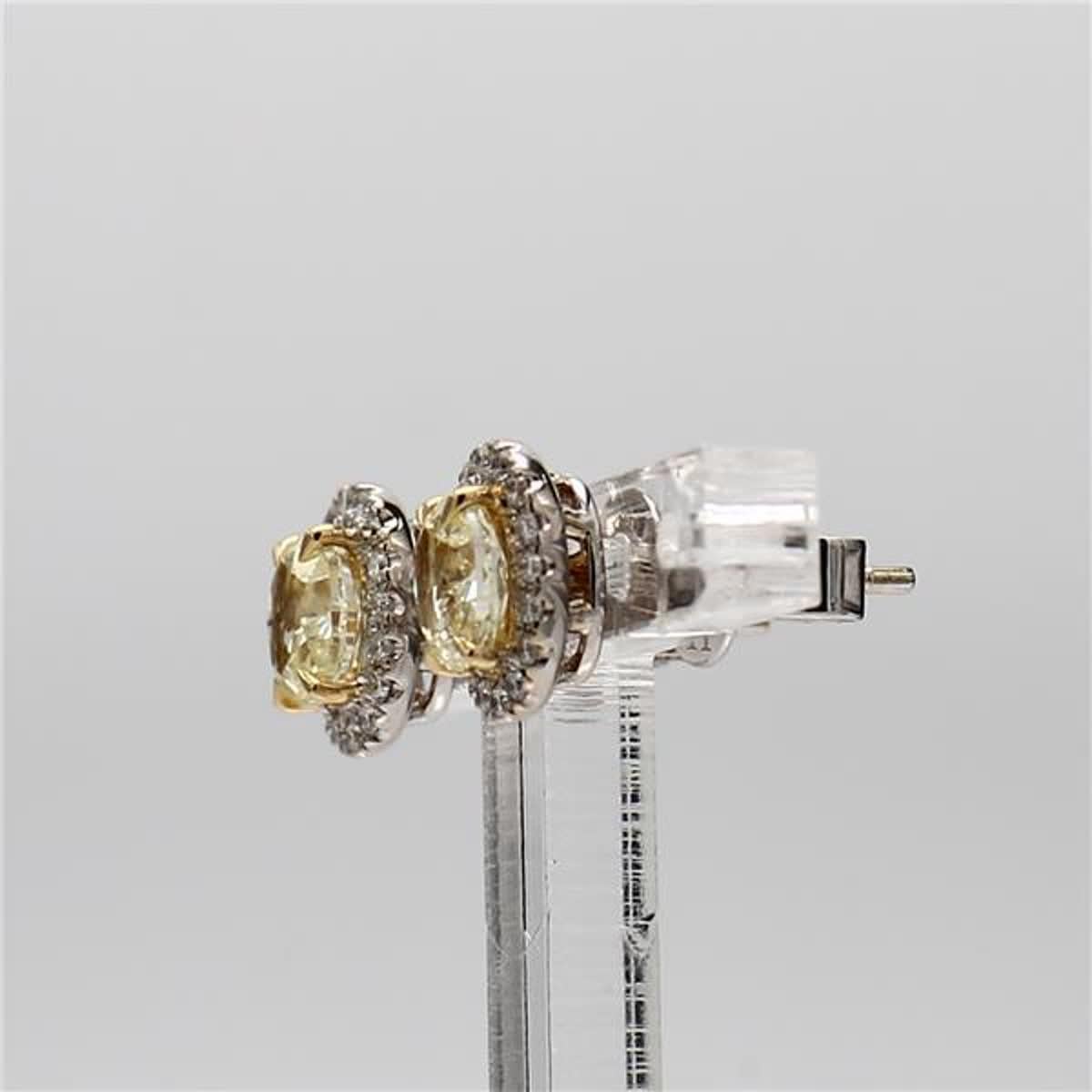 Contemporary Natural .53 Carat Yellow Oval and White Diamond Gold Stud Earrings For Sale