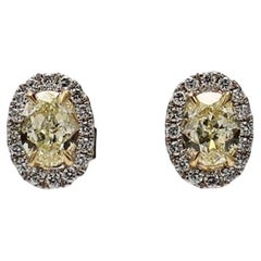 Natural .53 Carat Yellow Oval and White Diamond Gold Stud Earrings