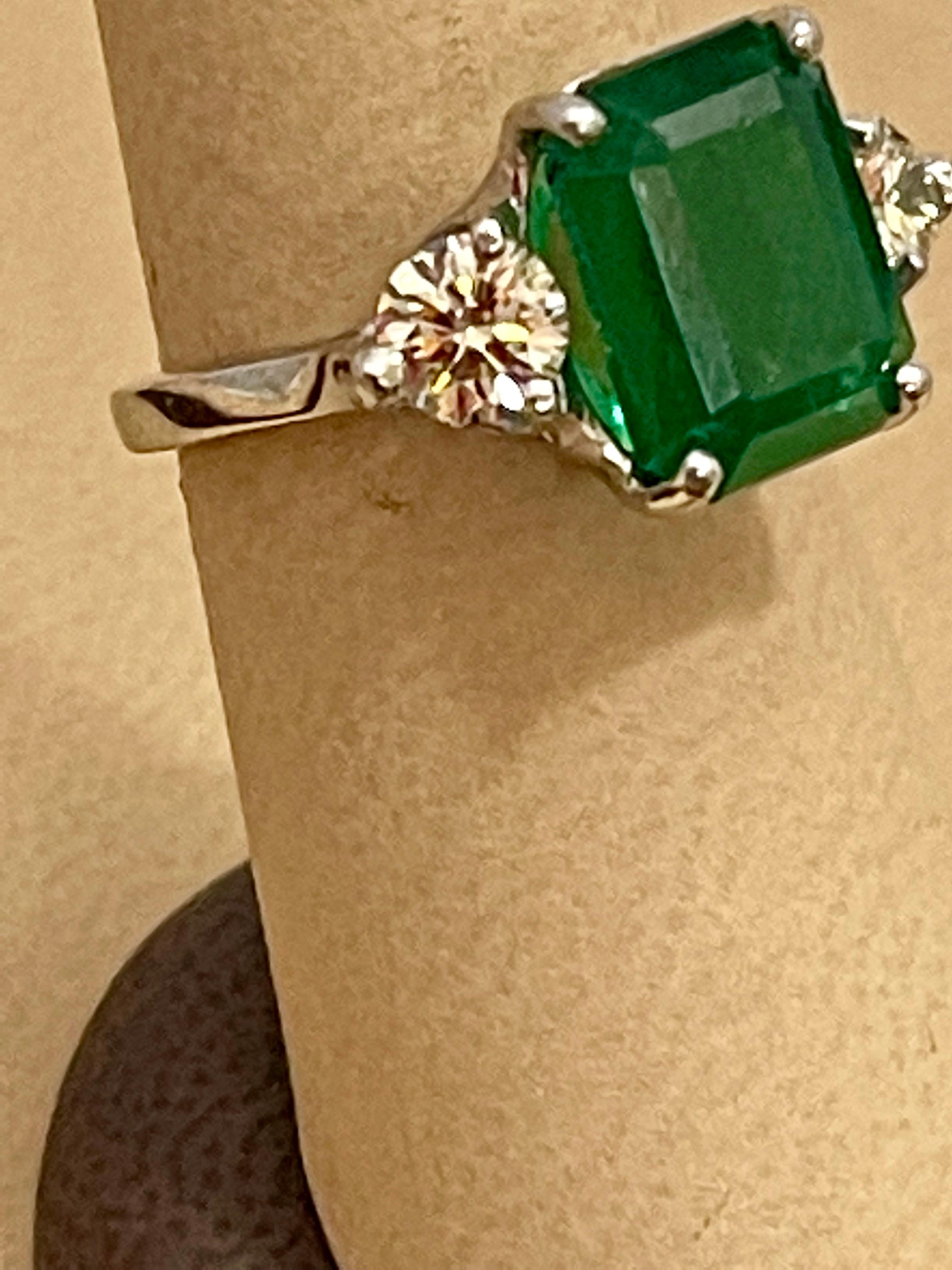 Natural 5.5 Carat Emerald Cut Emerald & 1.06 Carat Diamond Ring Platinum 4