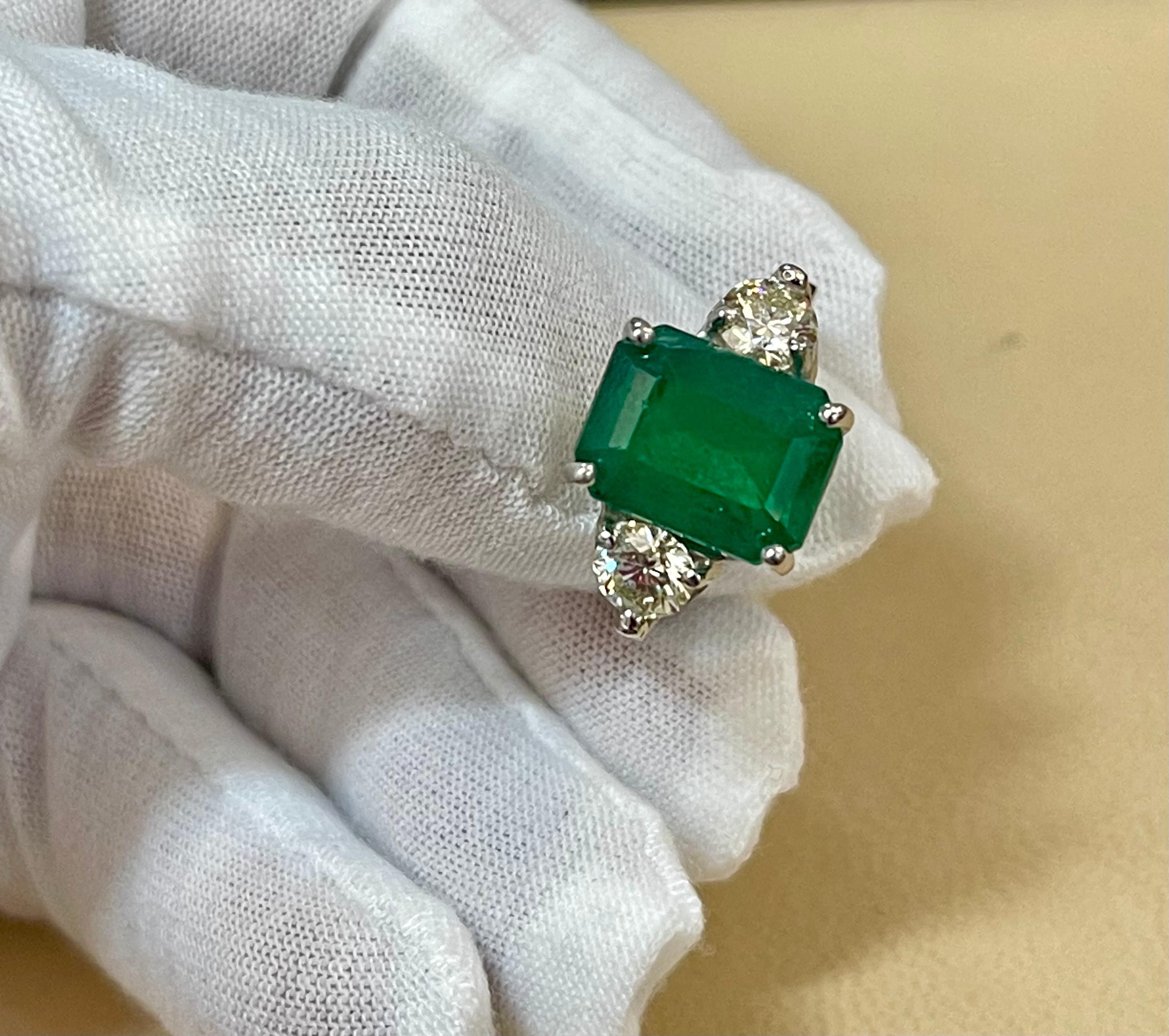 Natural 5.5 Carat Emerald Cut Emerald & 1.06 Carat Diamond Ring Platinum 7