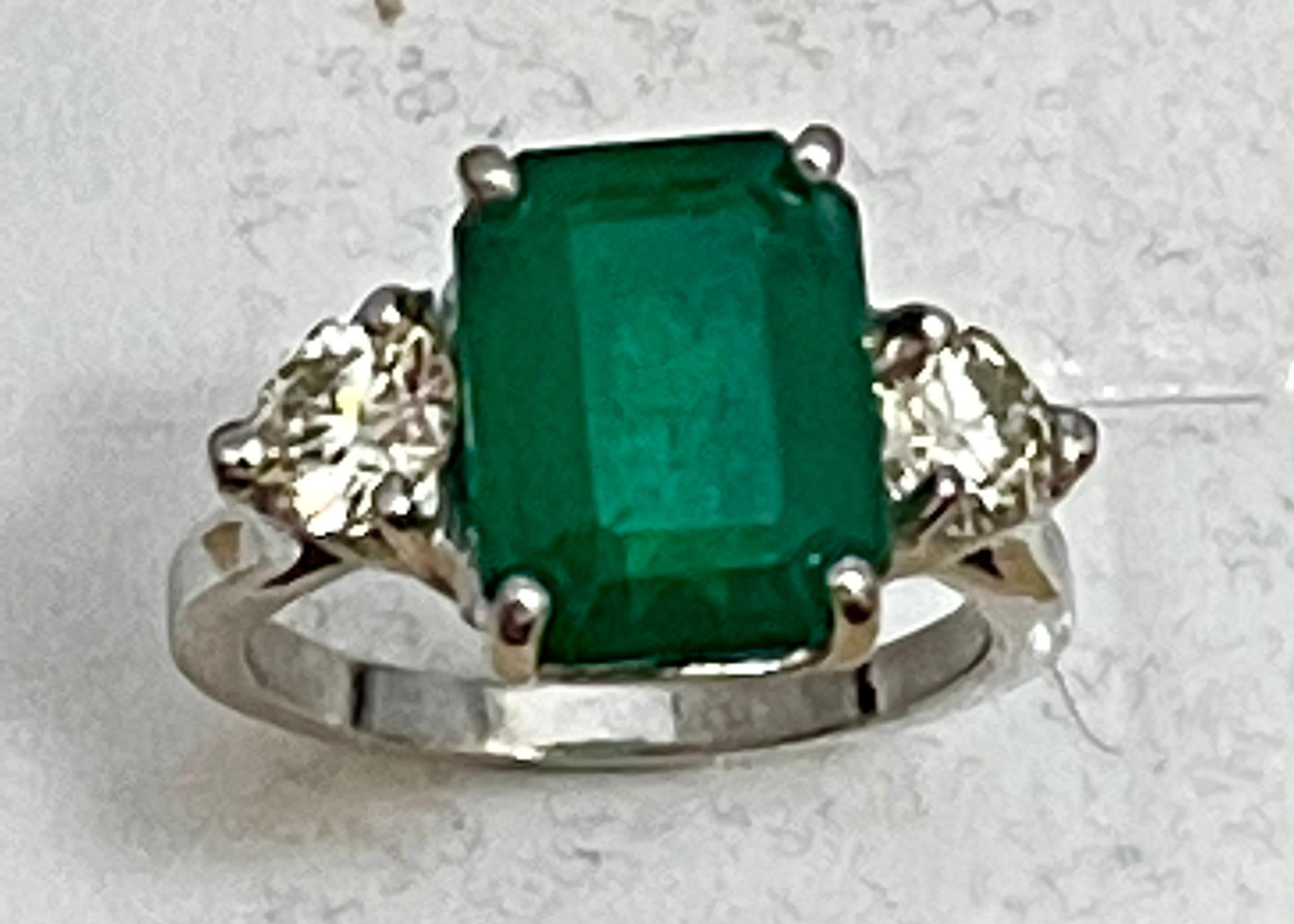 Natural 5.5 Carat Emerald Cut Emerald & 1.06 Carat Diamond Ring Platinum In Excellent Condition In New York, NY