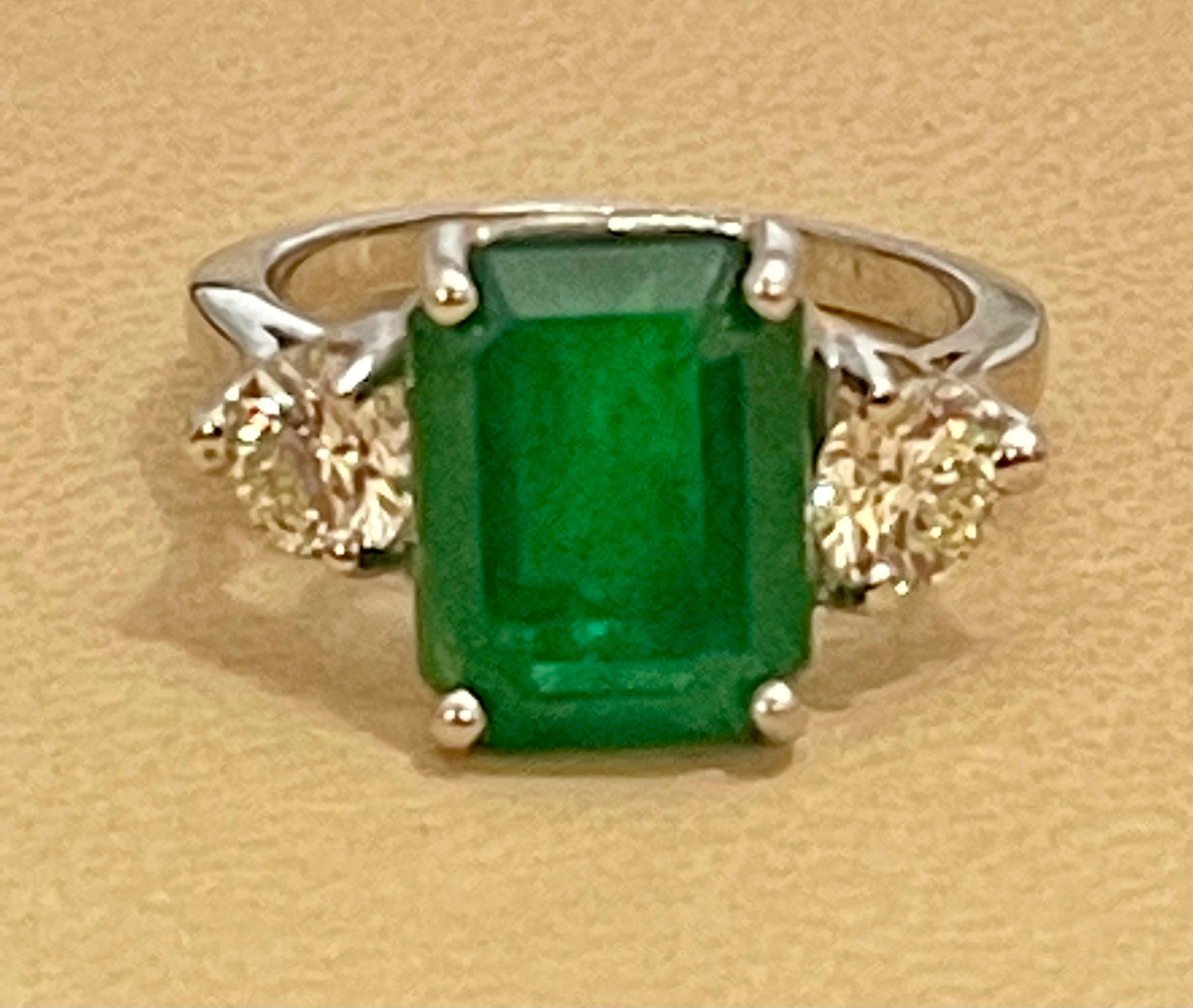 Natural 5.5 Carat Emerald Cut Emerald & 1.06 Carat Diamond Ring Platinum 1