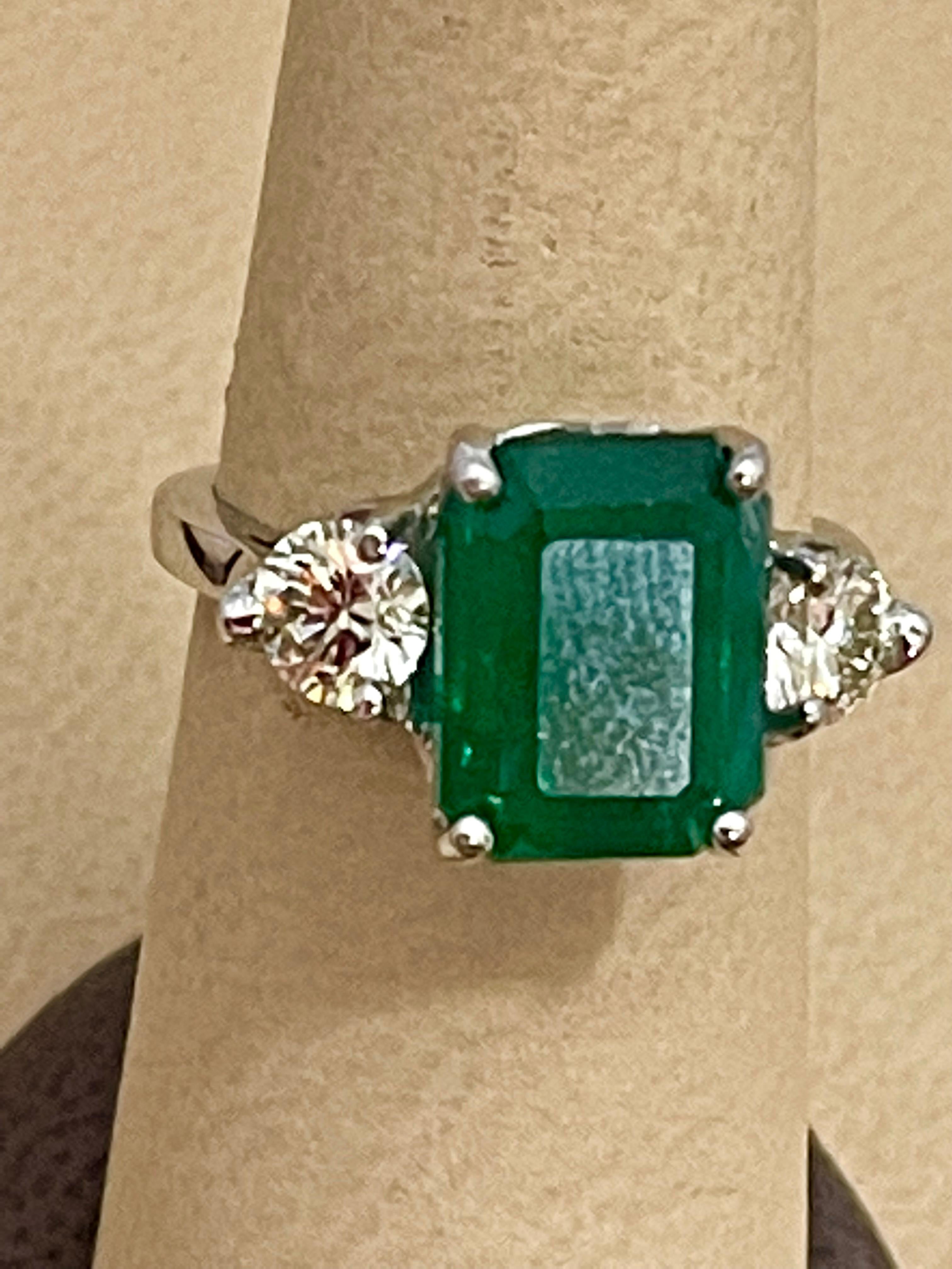 Natural 5.5 Carat Emerald Cut Emerald & 1.06 Carat Diamond Ring Platinum 3