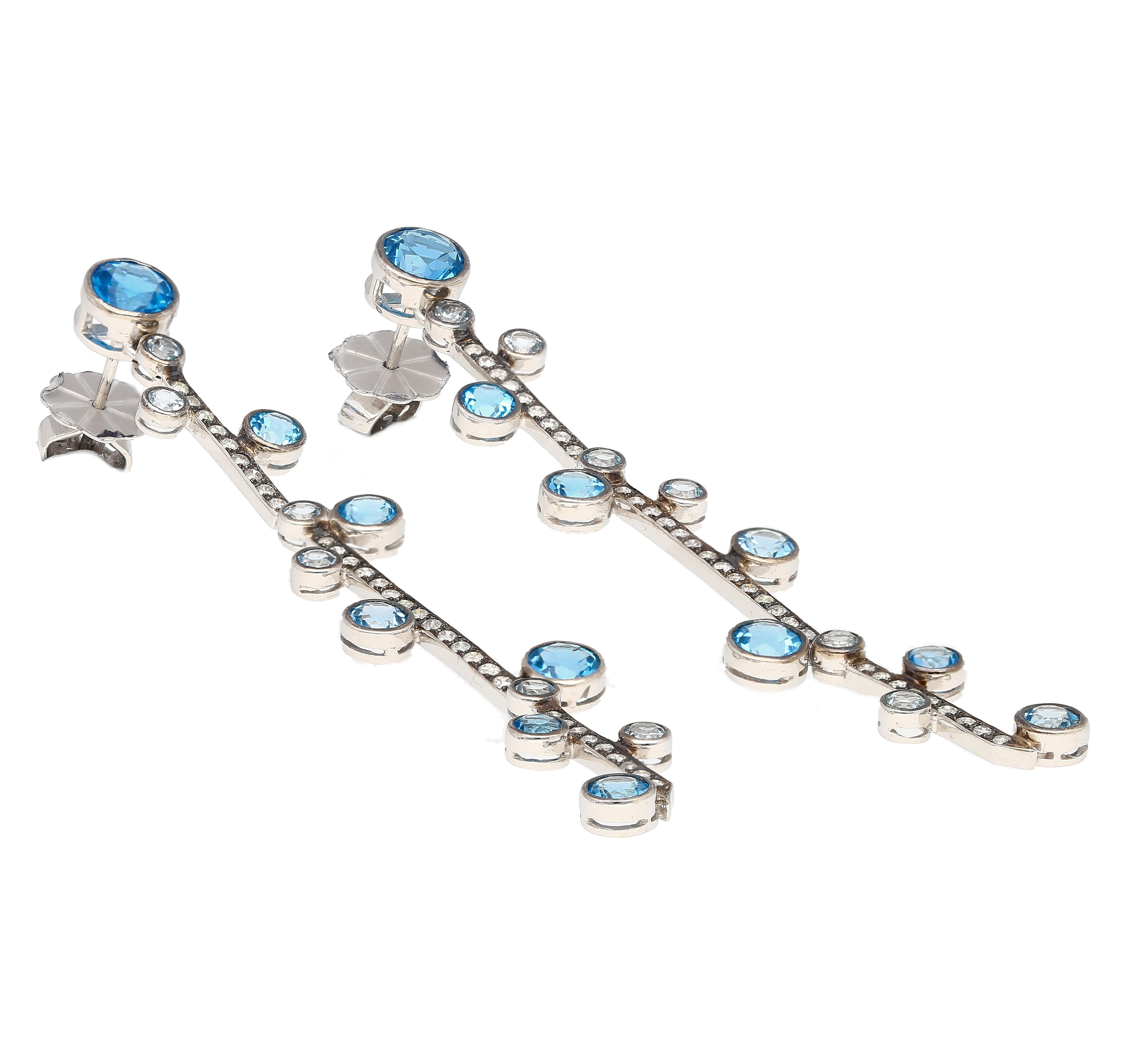 Modern Natural 5.65 CTTW Blue Topaz & Diamond Dangle Drop Earrings in 18K White Gold For Sale