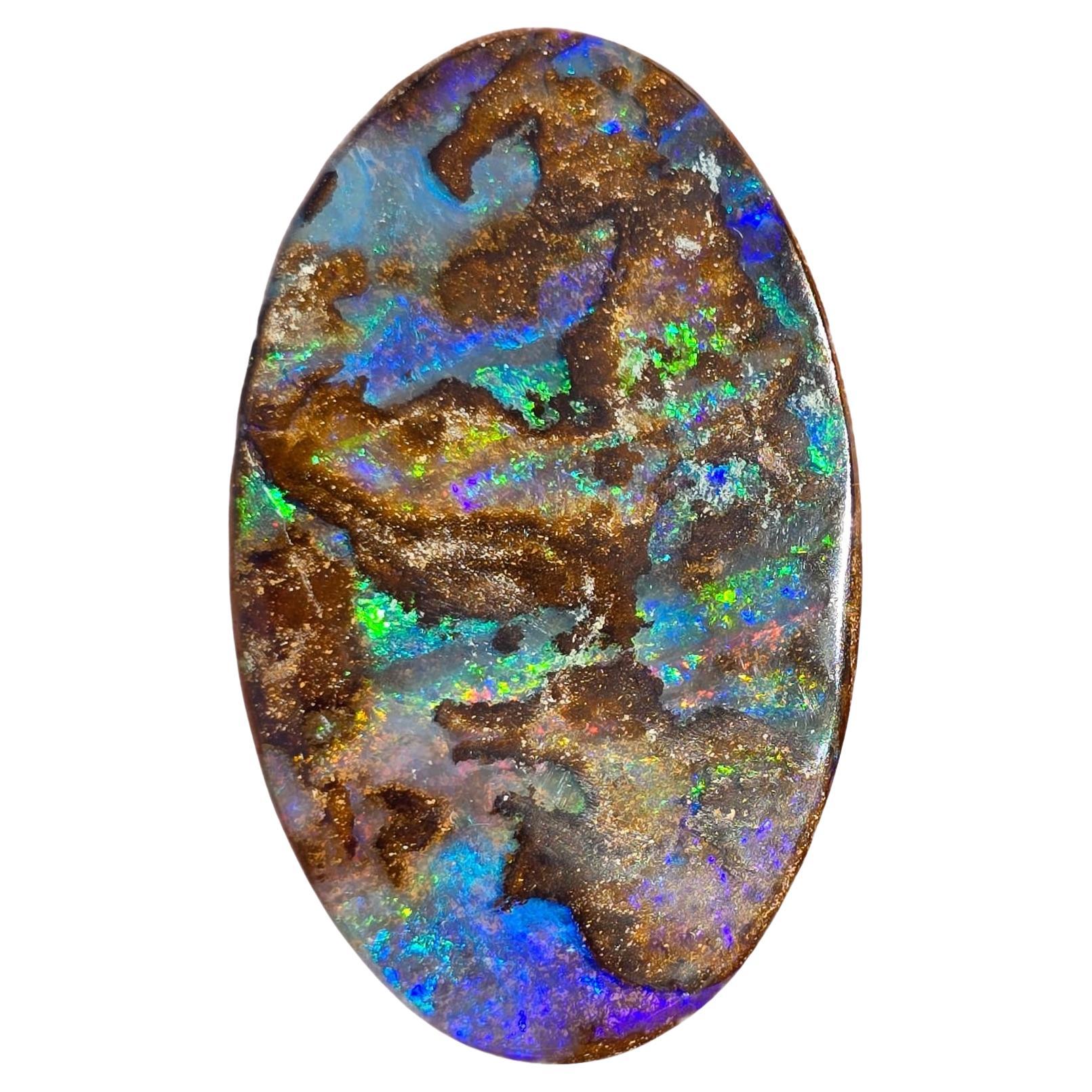 Natural 56.64 Ct Australian matrix boulder opal mined by Sue Cooper For Sale