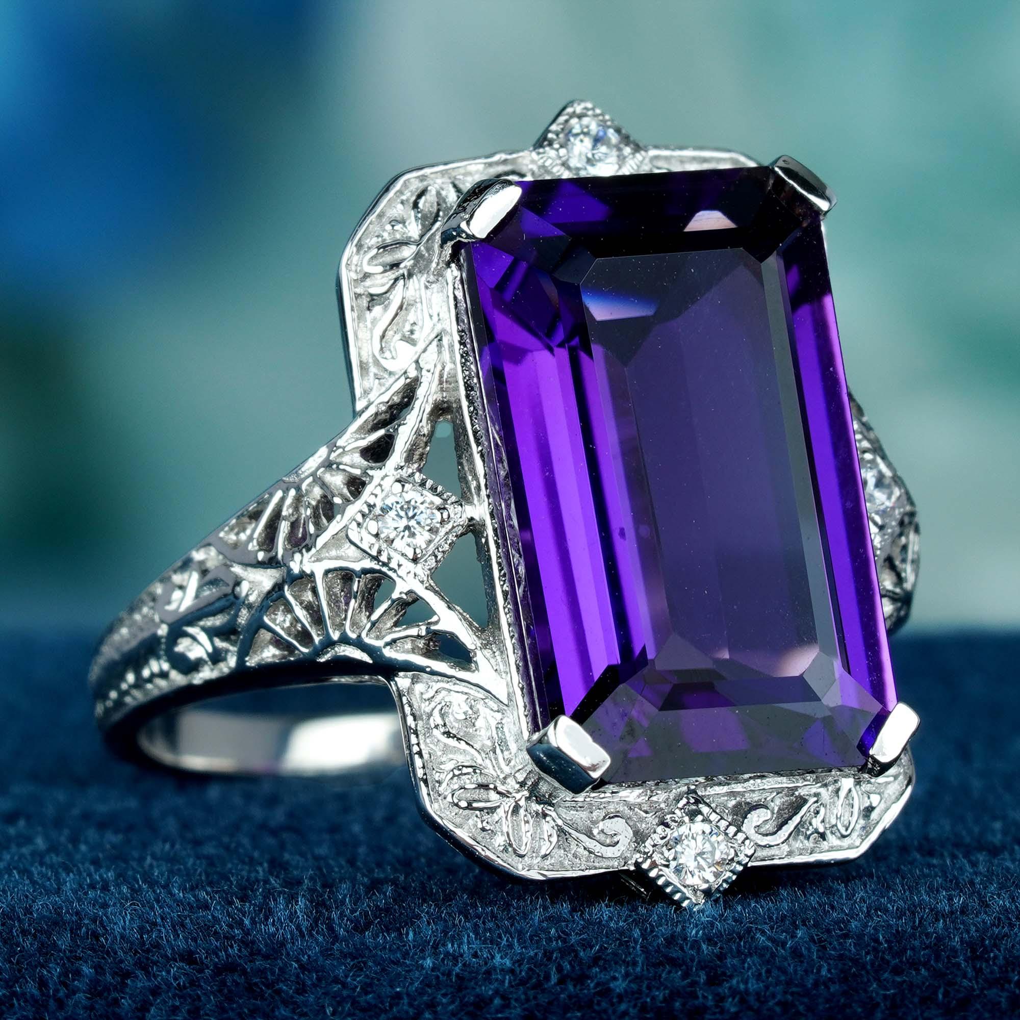 The ring is indeed a showstopper! The mesmerizing 6 carat emerald-cut amethyst, with a deep purple hue is both luxurious and eye-catching. The prong setting allows the amethyst to take center stage, while the intricate filigree detailing in a floral