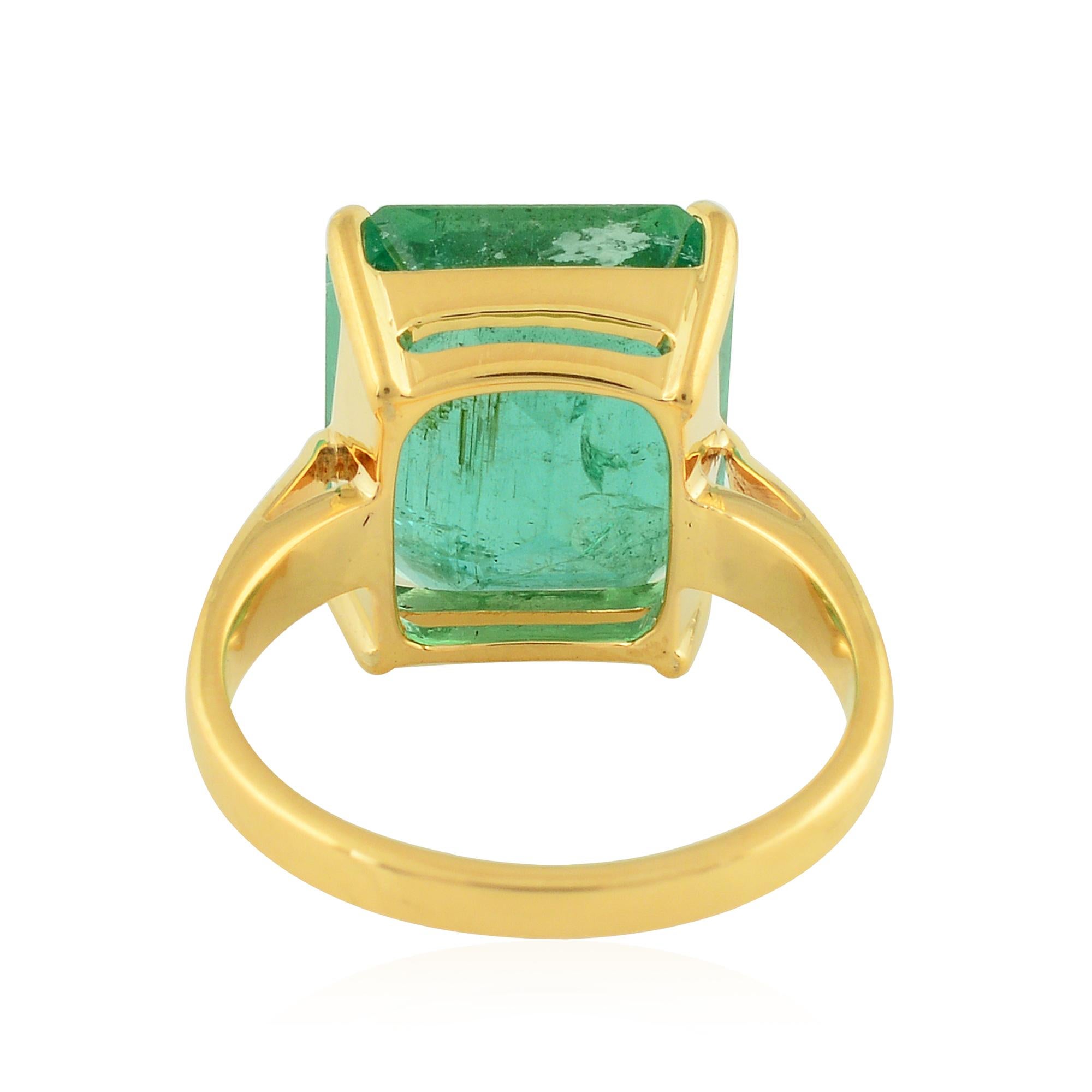 Immerse yourself in the captivating allure of this Natural 5.84 Carat Solitaire Zambian Emerald Gemstone Ring, meticulously set in radiant 18 Karat Yellow Gold. This exquisite piece of fine jewelry is a celebration of elegance and luxury, destined