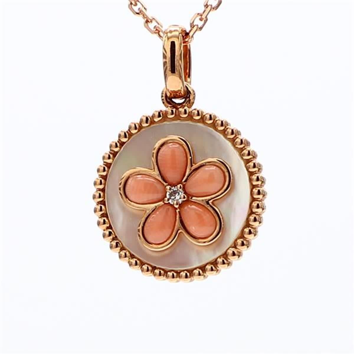 RareGemWorld's classic pink shell and pearl pendant. Mounted in a beautiful 18K Rose Gold setting with a round natural pearl and a flower shape natural pink shell. The center pieces are complimented by a natural round white diamond. This pendant is