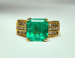 Natural 6.00 Carat Colombian Emerald and Diamond Ring