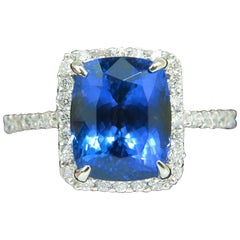 Natural 6.23 Carat Tanzanite Halo Diamond Ring A+ Cushion Cut and Luster VS