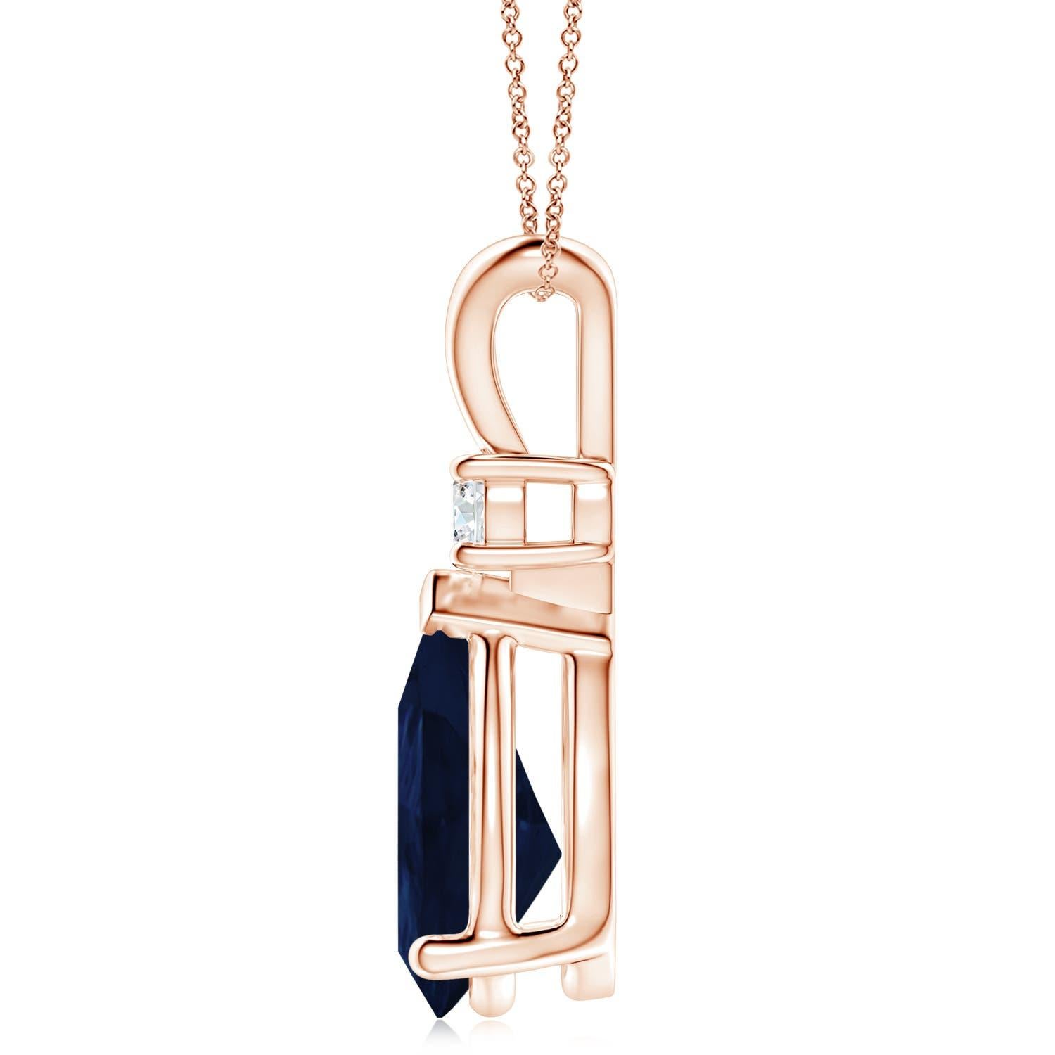 This classic solitaire pendant features a pear-shaped sapphire secured in a prong setting. A brilliant round diamond sits atop the blue gemstone adding to the design's charm. Simple yet appealing, this sapphire pendant in 14k rose gold is crafted