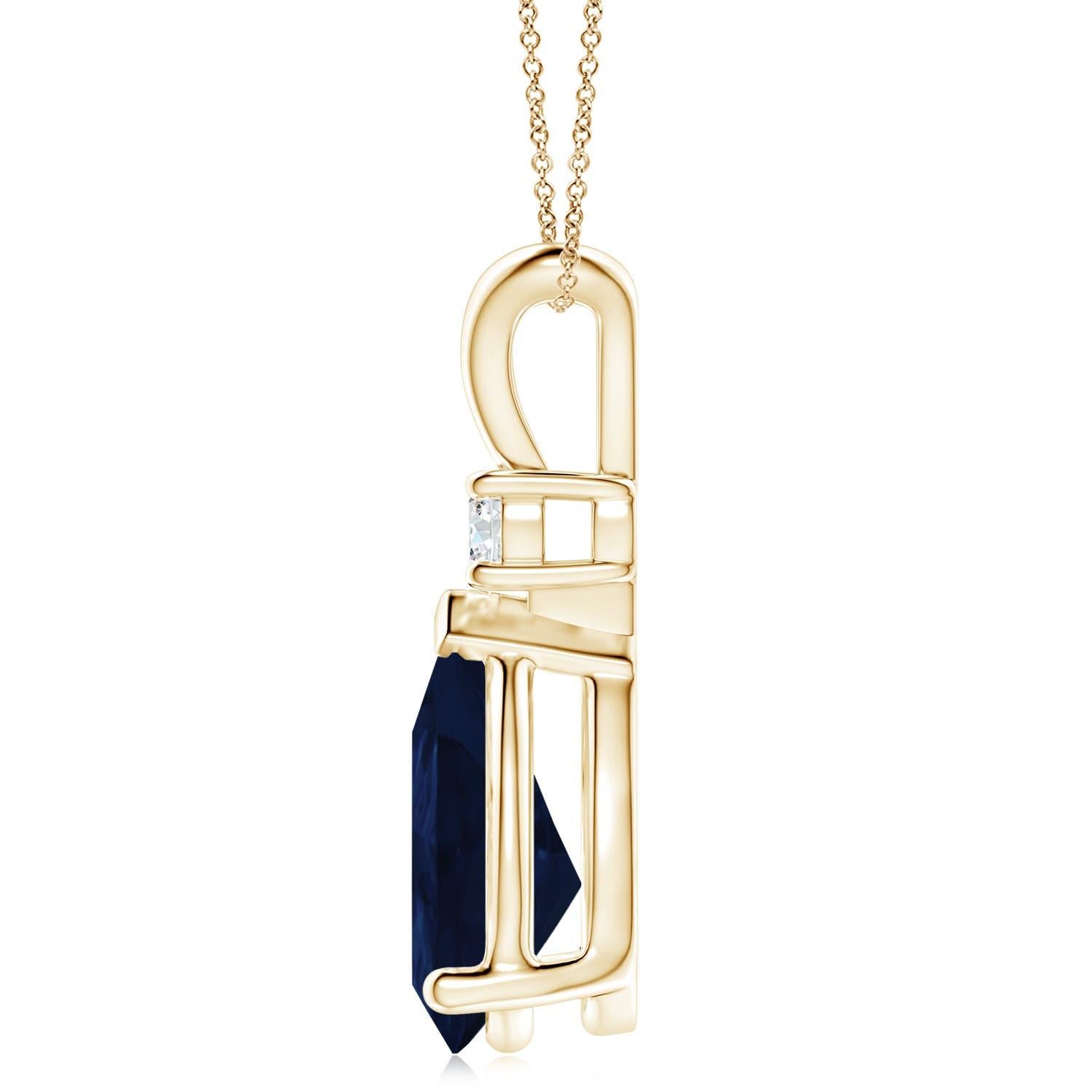 This classic solitaire pendant features a pear-shaped sapphire secured in a prong setting. A brilliant round diamond sits atop the blue gemstone adding to the design's charm. Simple yet appealing, this sapphire pendant in 14k yellow gold is crafted