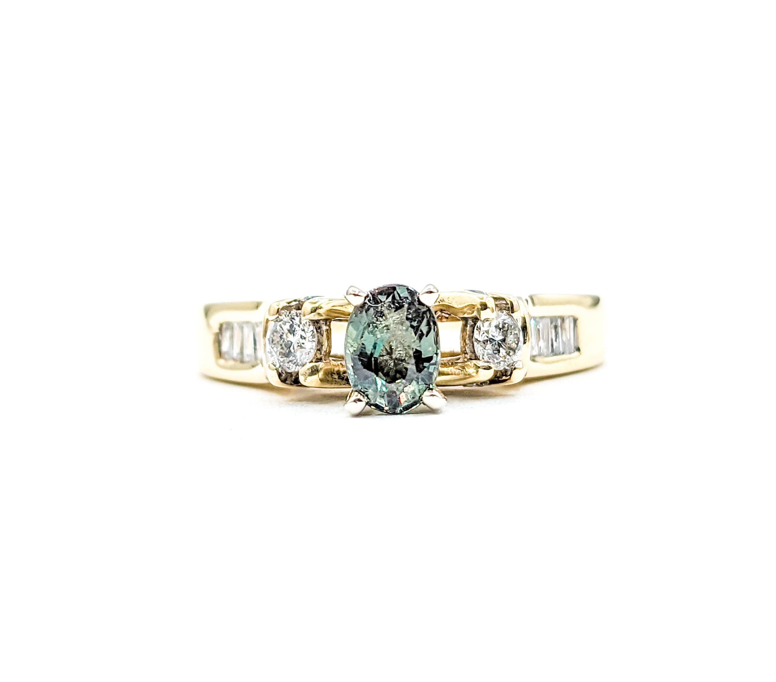 Natural .66ct Alexandrite & Diamond Ring Yellow Gold

Discover our exquisite ring, elegantly crafted in 14k yellow gold, featuring 0.40ctw of luminous diamonds. These sparkling diamonds are of I1 clarity and I color, adding a touch of brilliance.