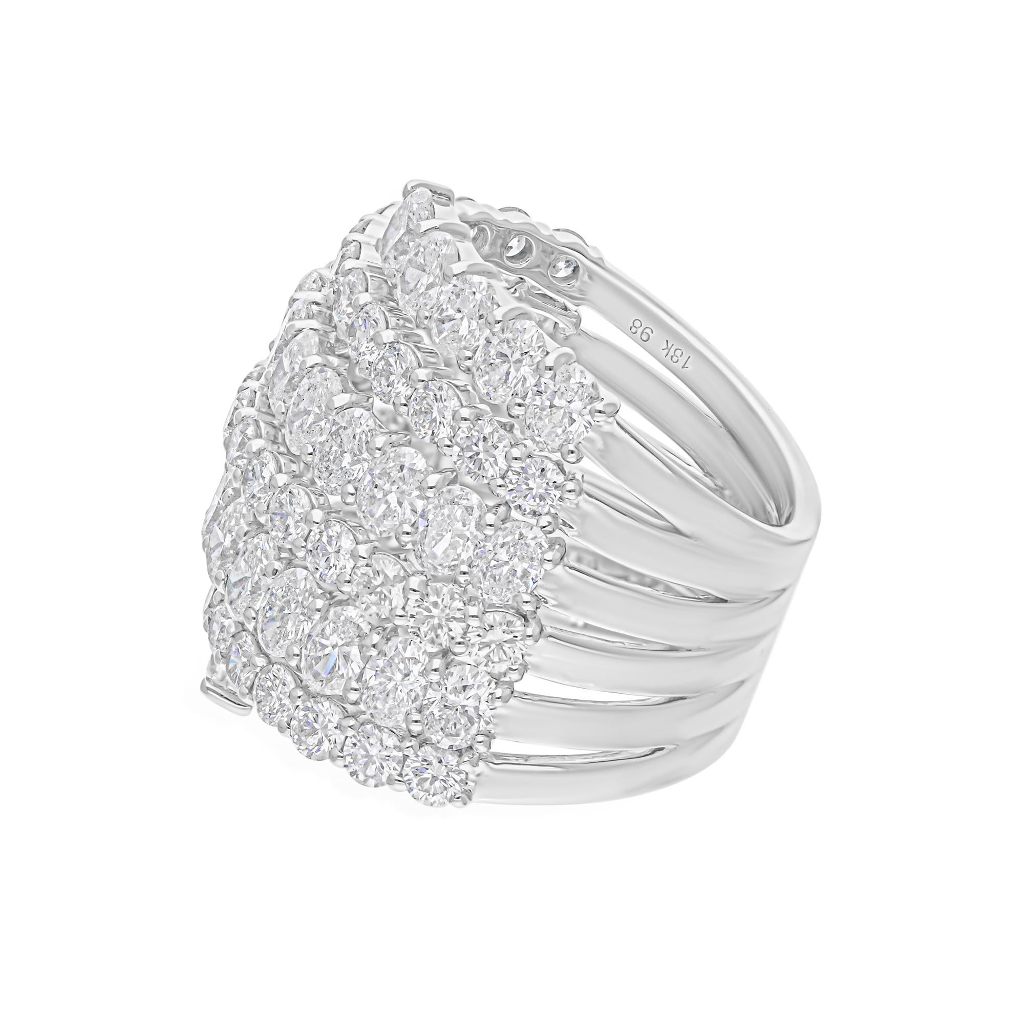 Expertly nestled within a spiral setting, the diamond takes on a new dimension of allure, as the spiral design gently embraces and accentuates its natural radiance. This innovative setting not only enhances the visual impact of the diamond but also
