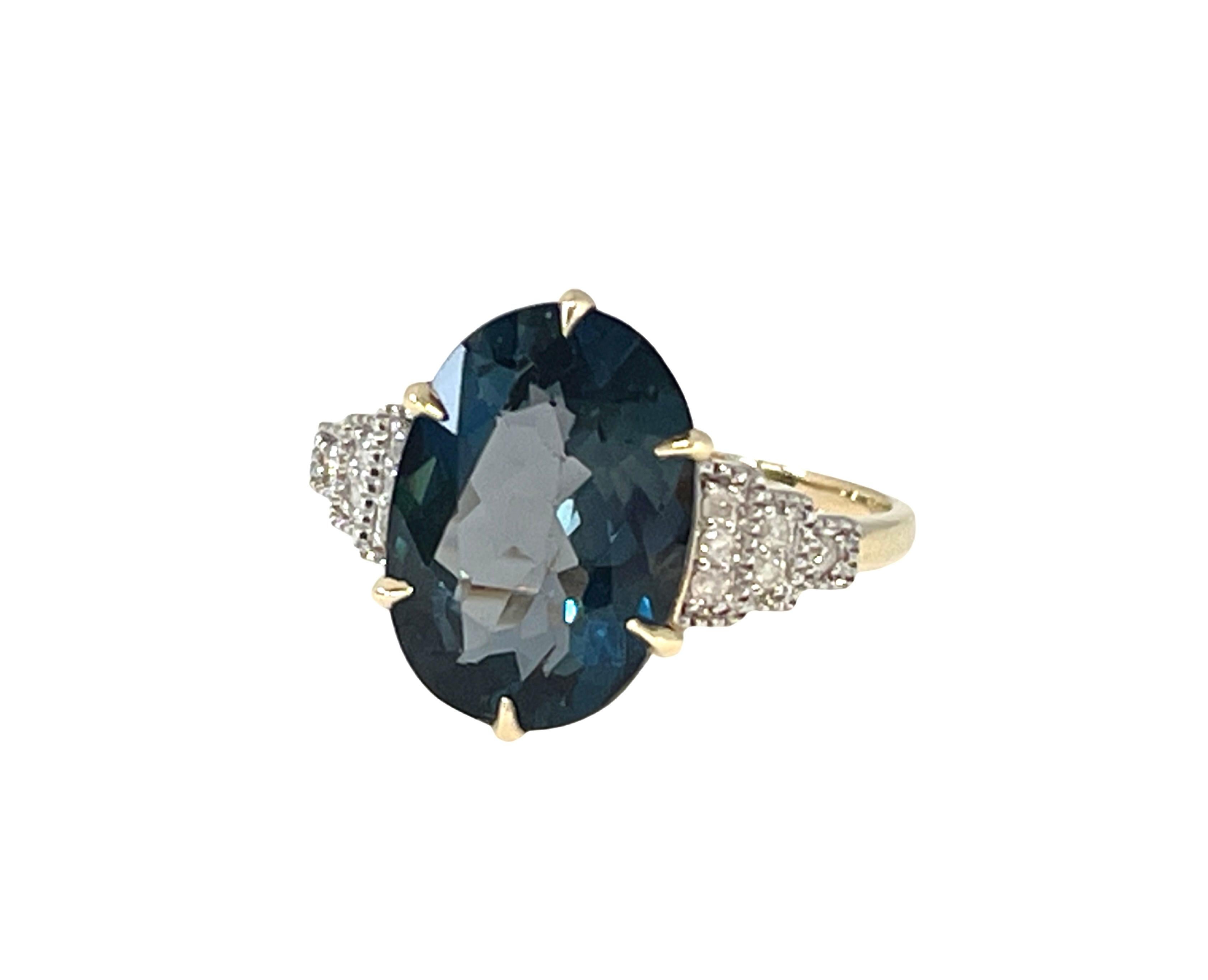 This stunning ring features a huge, Oval Cut, 6.25ct Natural London Topaz.  The London Topaz has the deeper blue hues that are closer to the colour of Sapphire as you can see by the photos. 
Topaz is also known for its eye clean clarity and high