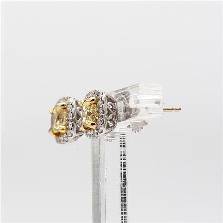 Contemporary Natural Yellow Radiant and White Diamond .89 Carat TW Gold Stud Earrings For Sale
