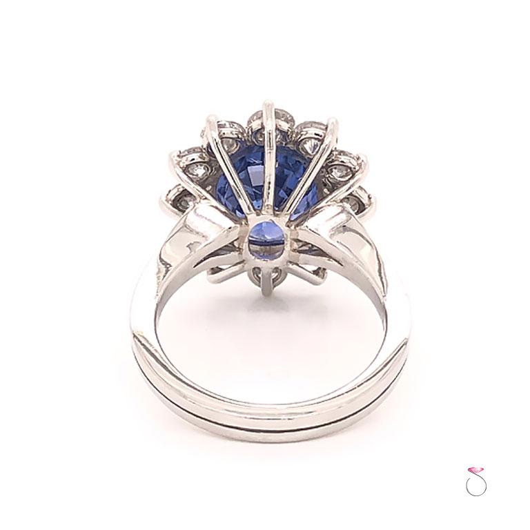 Modern Natural 7.08 Carat Blue Ceylon Sapphire Diamond Halo Ring in Platinum For Sale