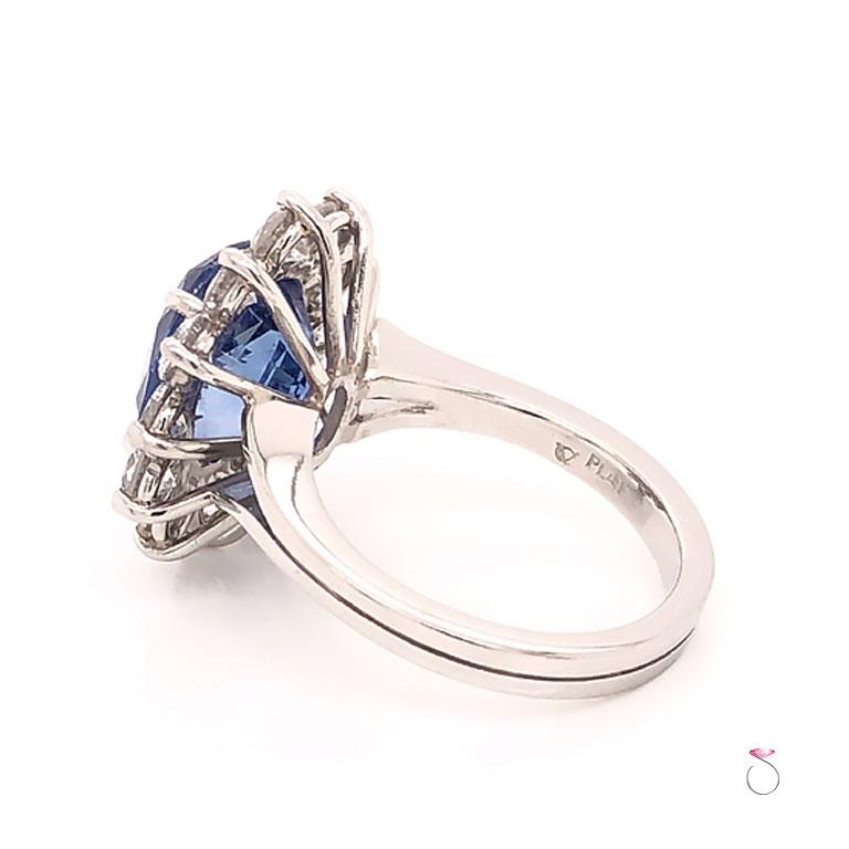 Oval Cut Natural 7.08 Carat Blue Ceylon Sapphire Diamond Halo Ring in Platinum For Sale