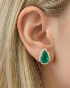 Orecchino con smeraldo naturale da 7,20 carati e diamante da 0,73 carati in oro 14k