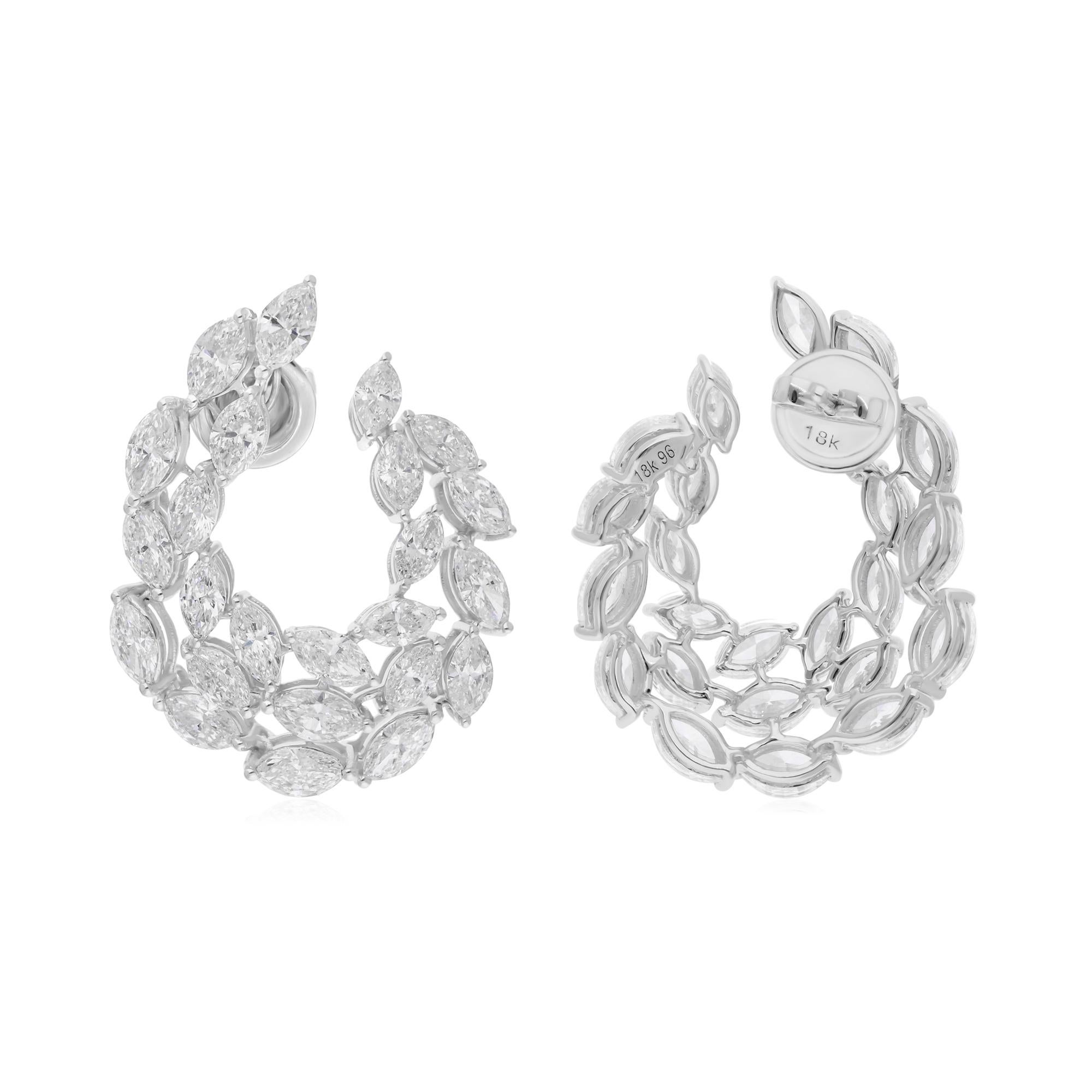Coulées dans de l'or 18 carats, ces boucles d'oreilles exquises sont serties de 7,26 carats de diamants étincelants.

Suivez la vitrine de Spectrum Jewels pour découvrir la dernière collection et les pièces exclusives. Spectrum Jewels est fièrement