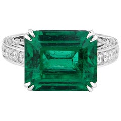Natural 7.29 Carat Green Emerald 18 Karat White Gold Cocktail Diamond Ring
