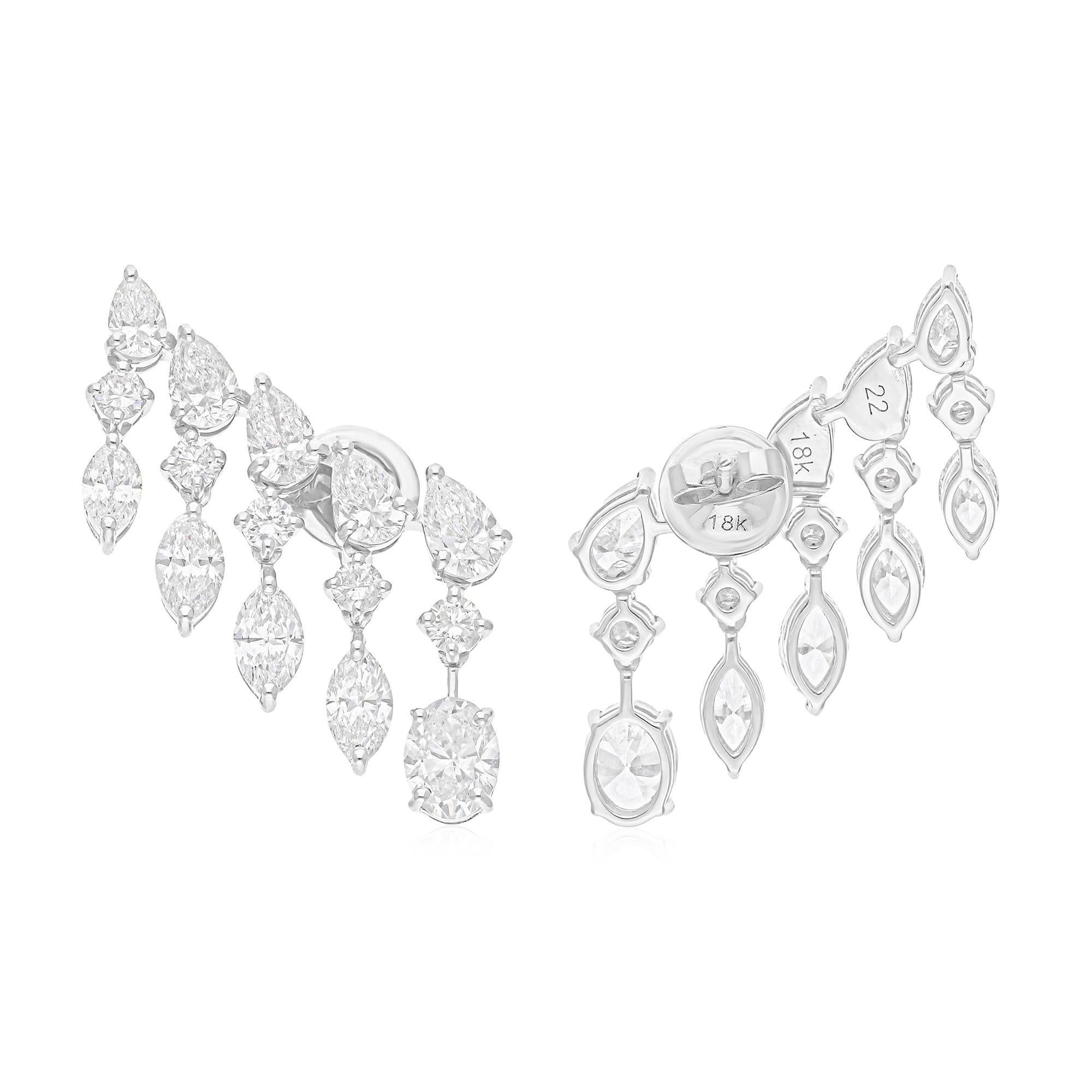 Coulées dans de l'or 14 carats, ces boucles d'oreilles exquises sont serties de 7,31 carats de diamants étincelants.

Suivez la vitrine de Spectrum Jewels pour découvrir la dernière collection et les pièces exclusives. Spectrum Jewels est fièrement