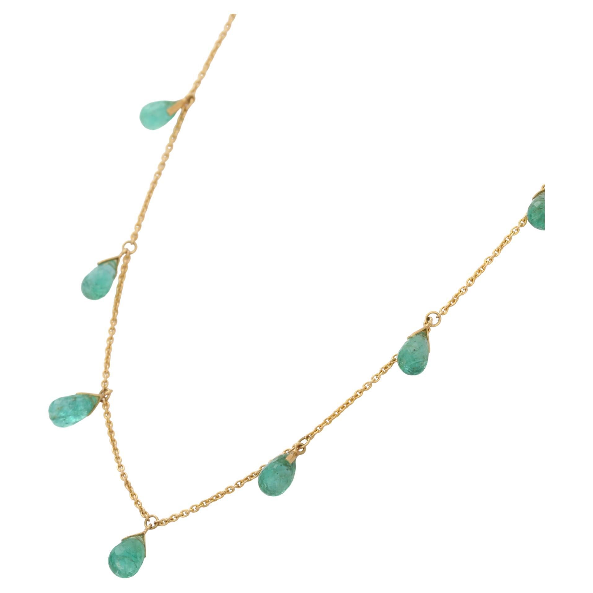 Emerald Necklace in 18K Gold studded with drop cut emeralds.
Accessorize your look with this elegant emerald drop necklace. This stunning piece of jewelry instantly elevates a casual look or dressy outfit. Comfortable and easy to wear, it is just as