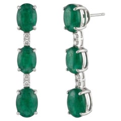 Natural 7.65CTS Emerald & 0.10CTS Diamond Earring in 18K Gold