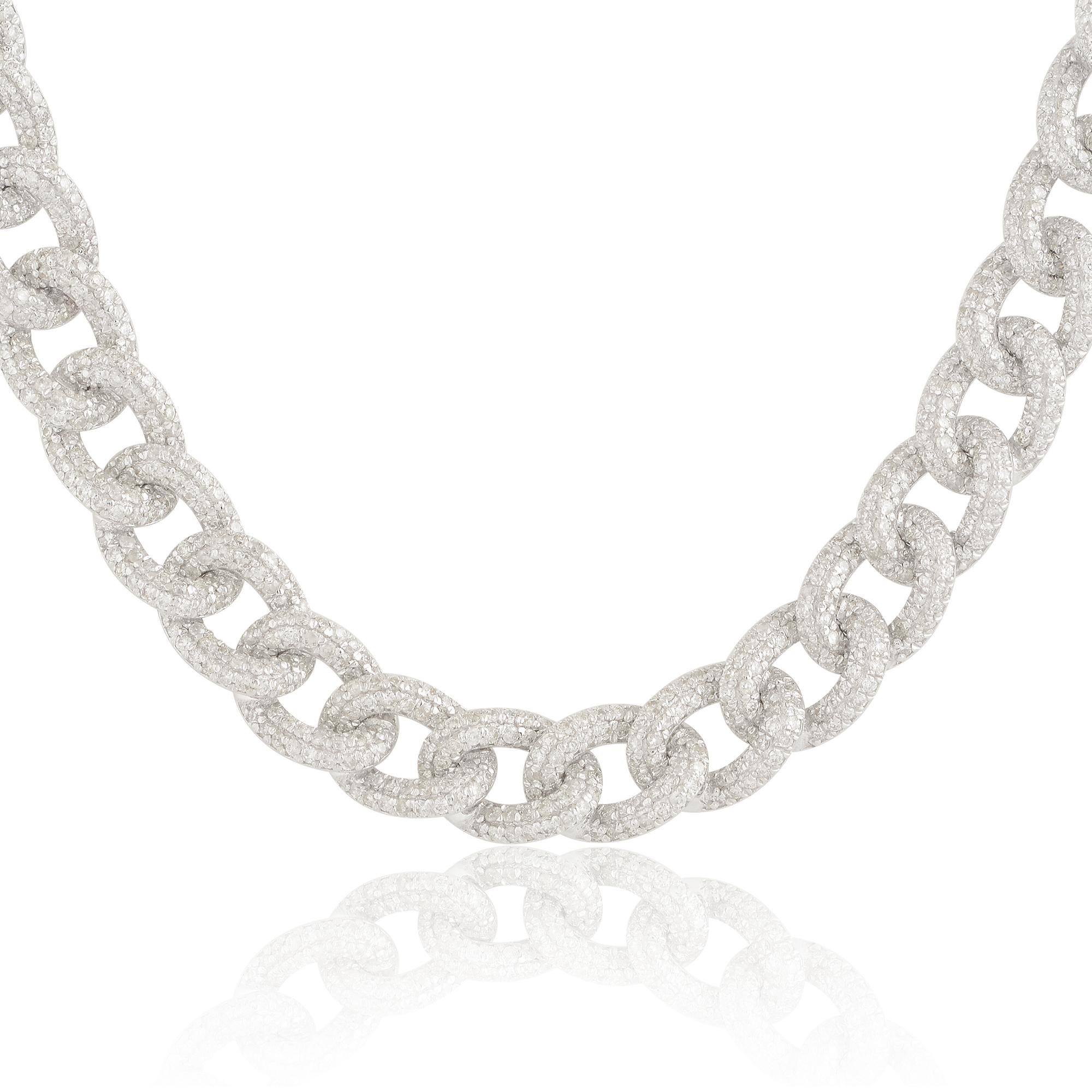 Crafted from 18 karat white gold, the setting of the necklace provides a stunning backdrop for the diamonds. The white gold complements the diamonds' brilliance, allowing them to take center stage and captivate the eye. Its lustrous finish adds a