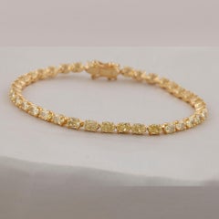 Natural 7.78 Carat SI/H Oval Yellow Diamond Bracelet 18 Karat Yellow Gold