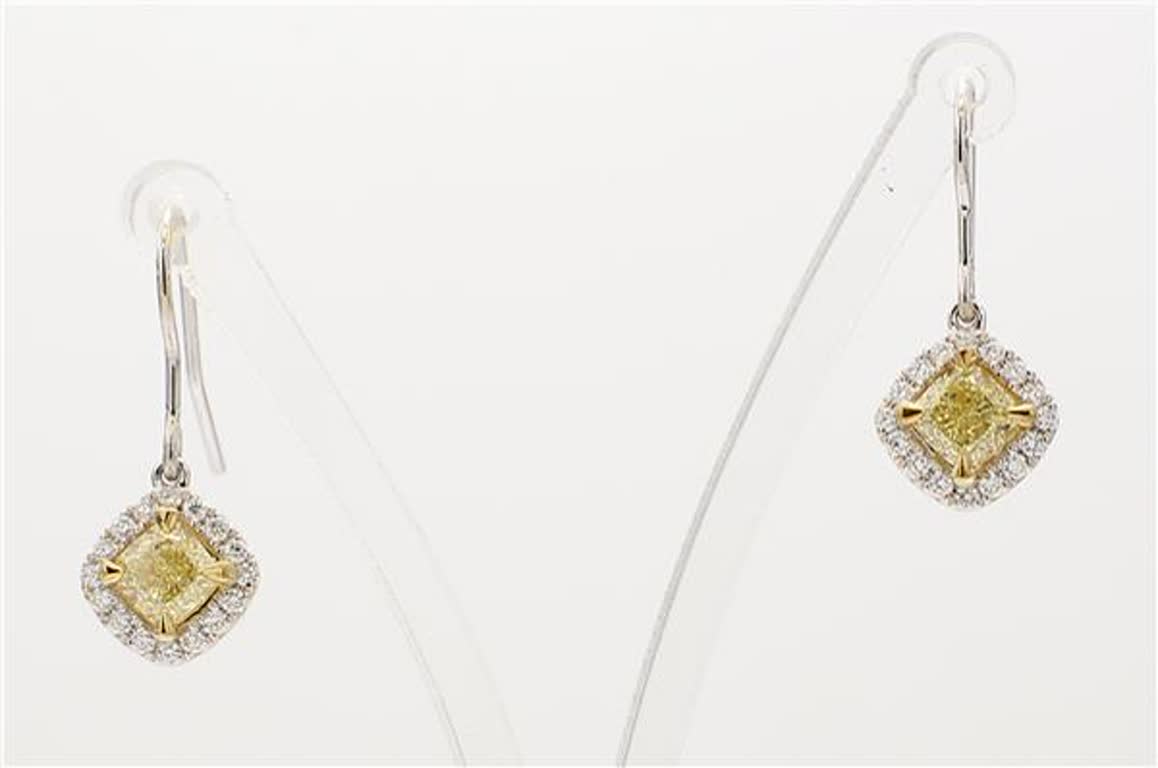 RareGemWorld's classic natural radiant cut yellow diamond earrings. Mounted in a beautiful 14K Yellow and White Gold setting with natural radiant cut yellow diamonds. The yellow diamonds are surrounded by small round natural white diamond melee.