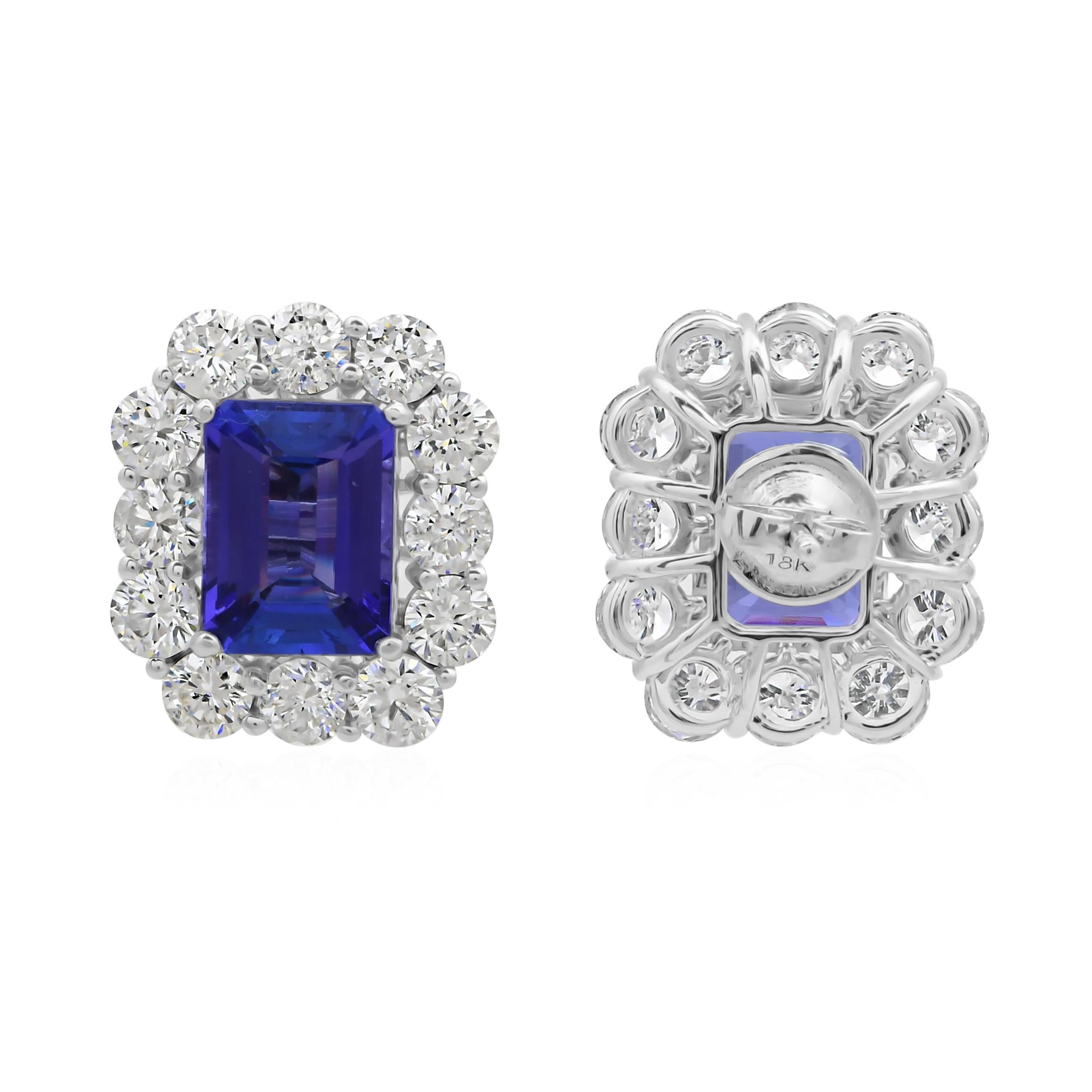 Diese exquisiten Ohrringe sind aus 18-karätigem Gold gegossen und mit 8,19 Karat Tansanit und 5,48 Karat funkelnden Diamanten besetzt.

FOLLOW SPECTRUM JEWELS Storefront, um die neueste Collection'S und exklusive Stücke zu sehen. Spectrum Jewels ist