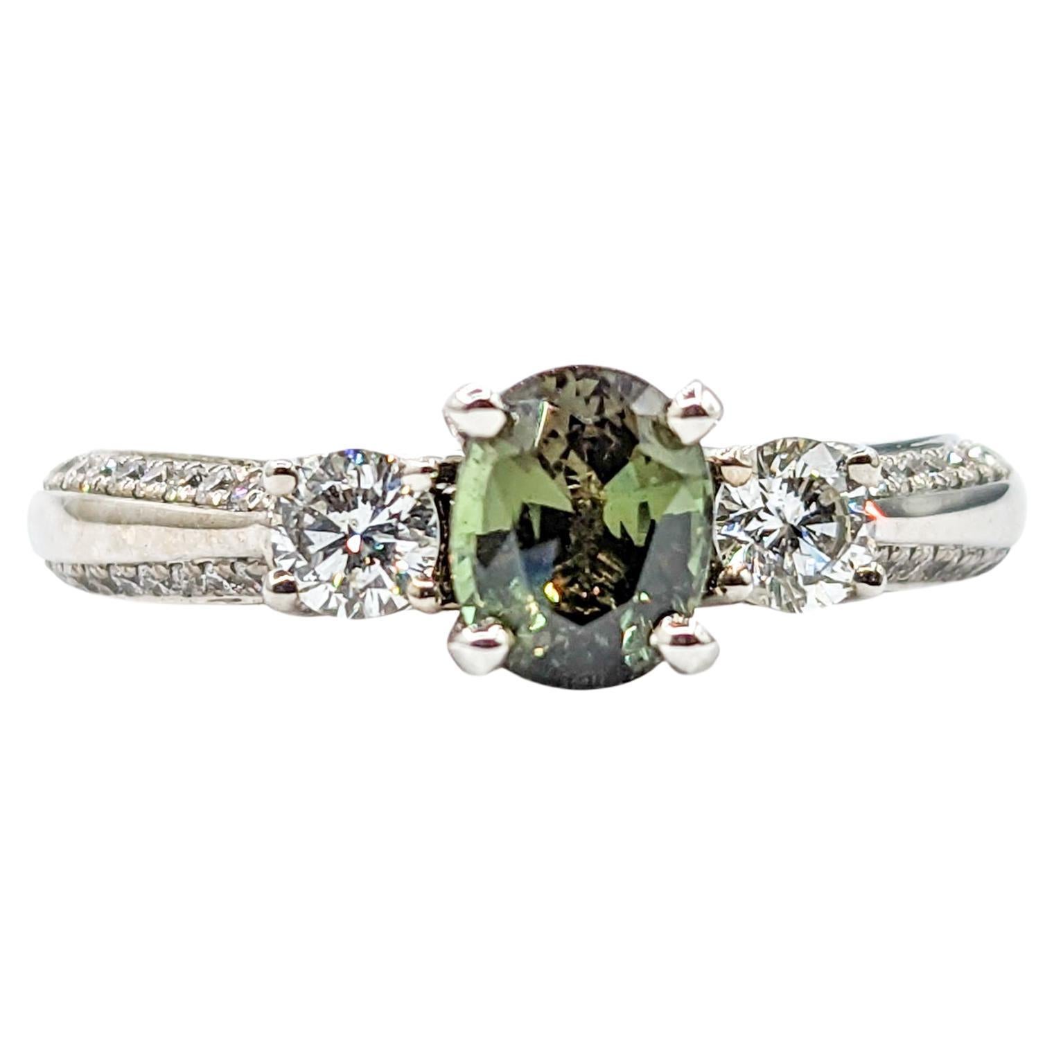 Natural .85ct Alexandrite & Diamond Ring White Gold 

Introducing this magnificent Ring, a masterpiece of design, crafted in 14kt white gold. It features an exquisite array of diamonds, totaling 1.00 carat, each shimmering with SI clarity and a near
