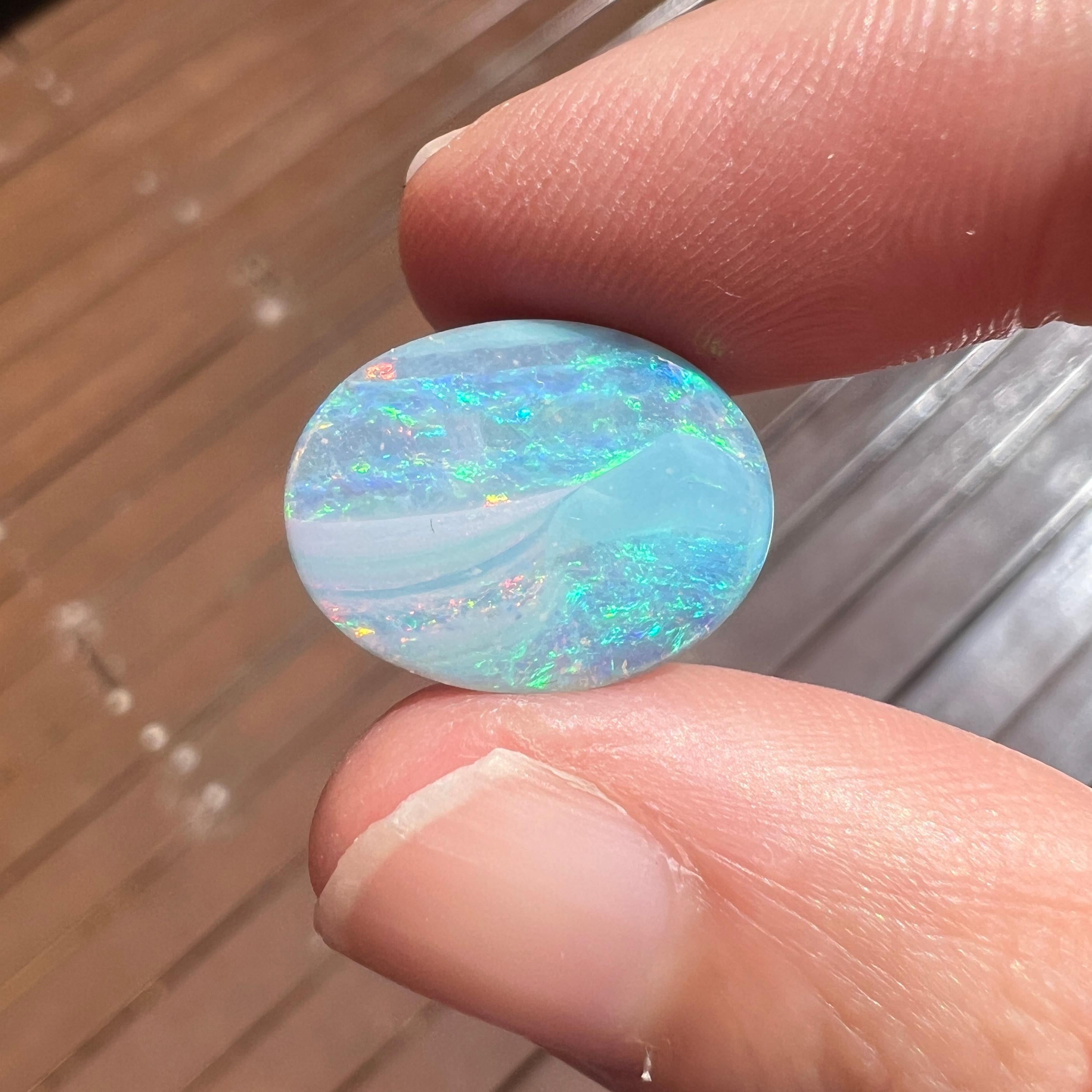 Cabochon Natural 8.68 Ct Australian boulder opal mined by Sue Cooper For Sale