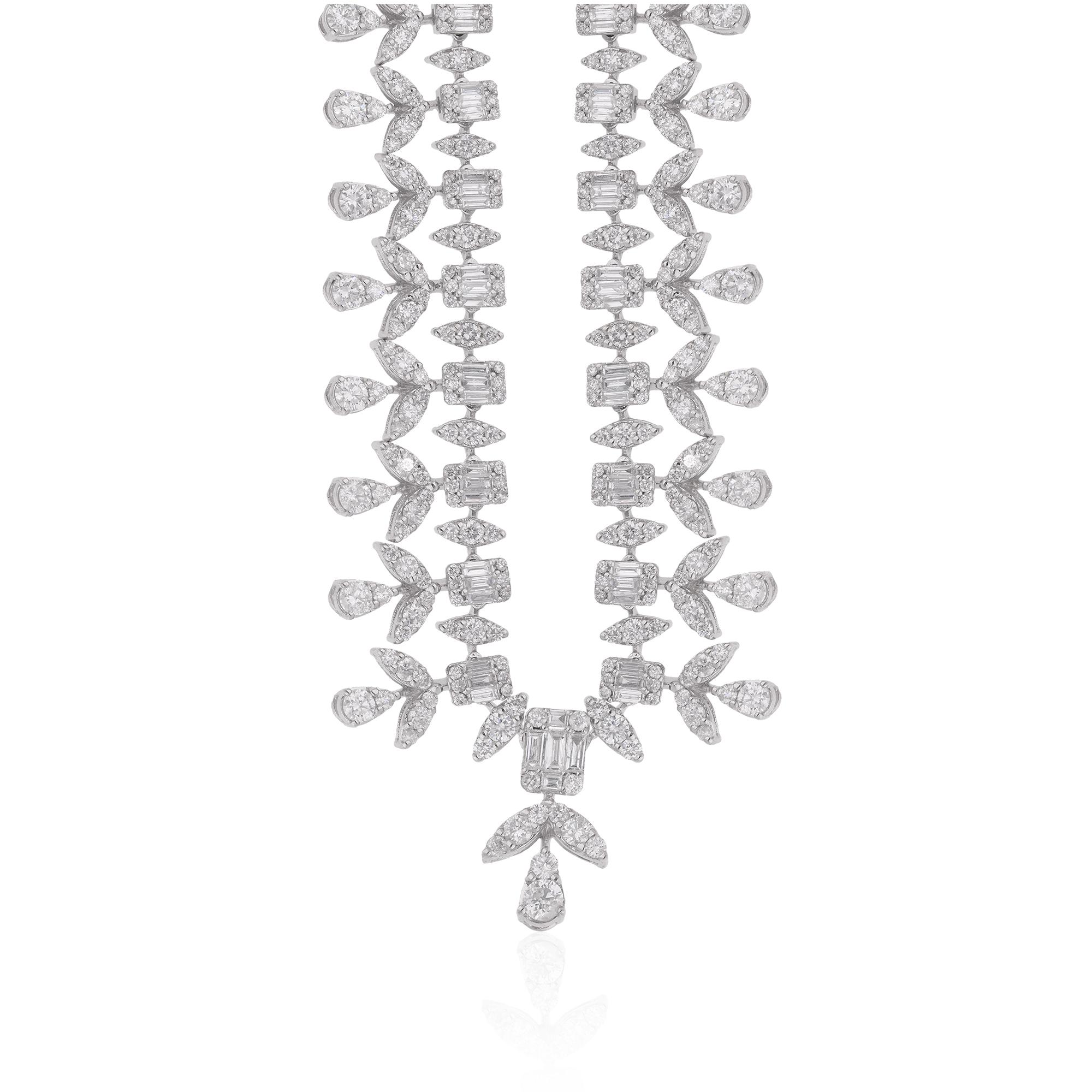 Indulge in the epitome of luxury and sophistication with this Natural 8.84 Carat Baguette & Round Diamond Necklace, meticulously crafted in 18 karat white gold. This exquisite necklace features a dazzling array of baguette and round diamonds,