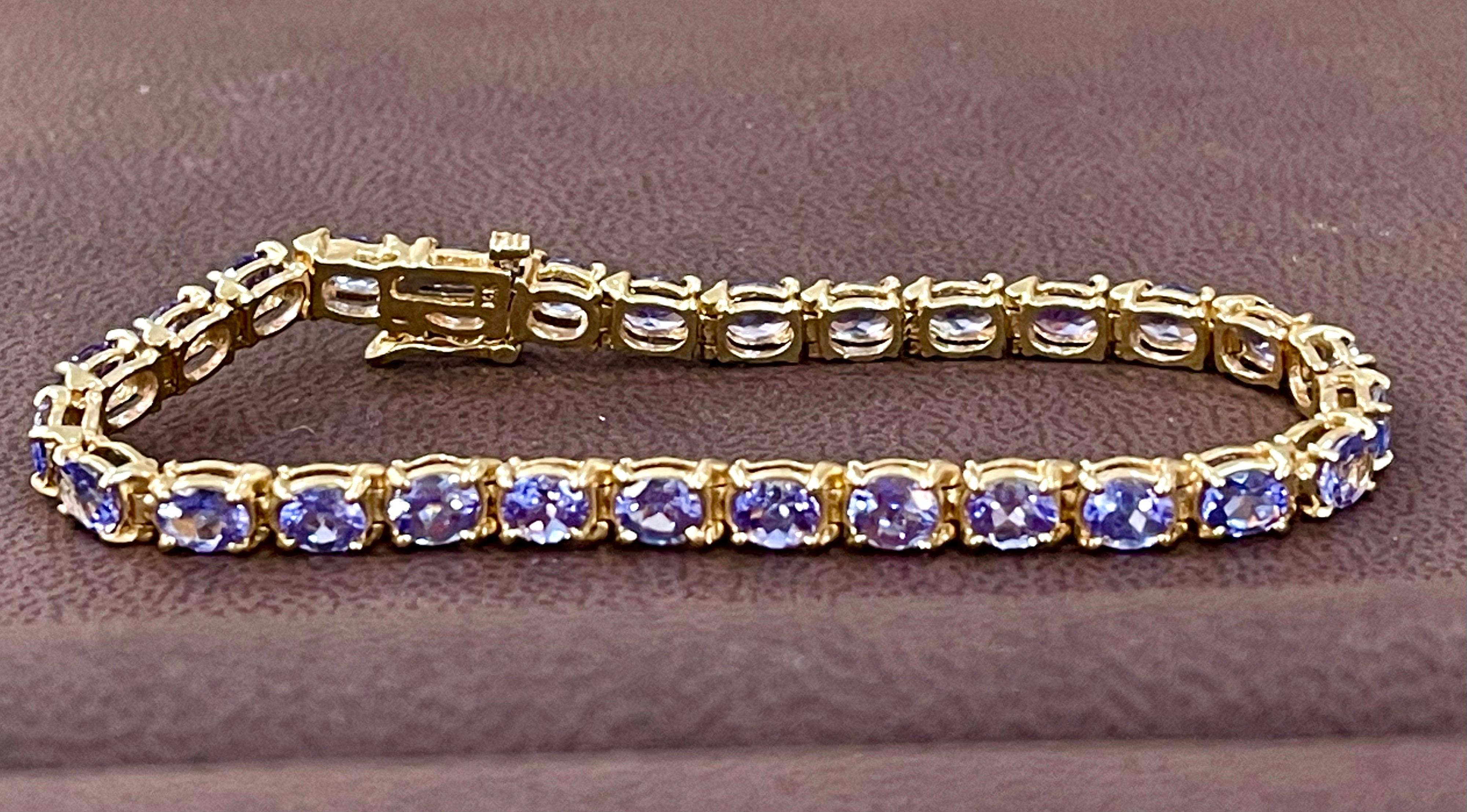 Natural 9 Carat Oval Tanzanite Tennis Bracelet 14 Karat Yellow Gold 3