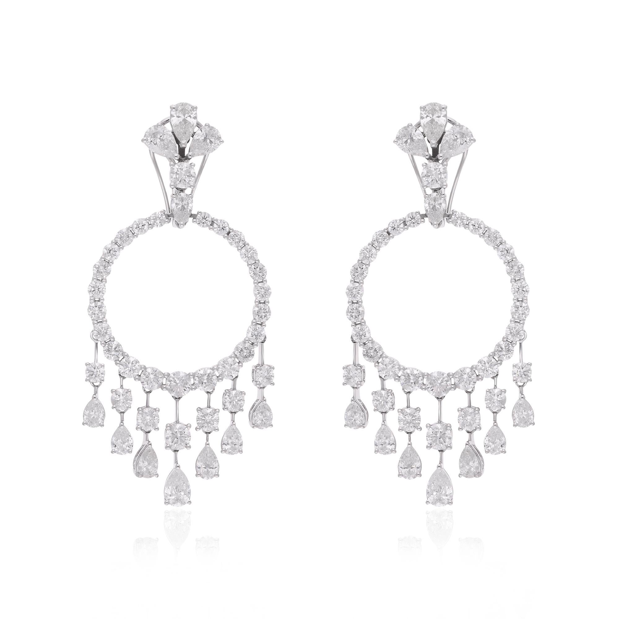 The design of these chandelier earrings is nothing short of mesmerizing. Cascading from the top, a delicate array of diamonds descends in a graceful, chandelier-inspired pattern. Each diamond is meticulously set in lustrous 14 Karat White Gold,