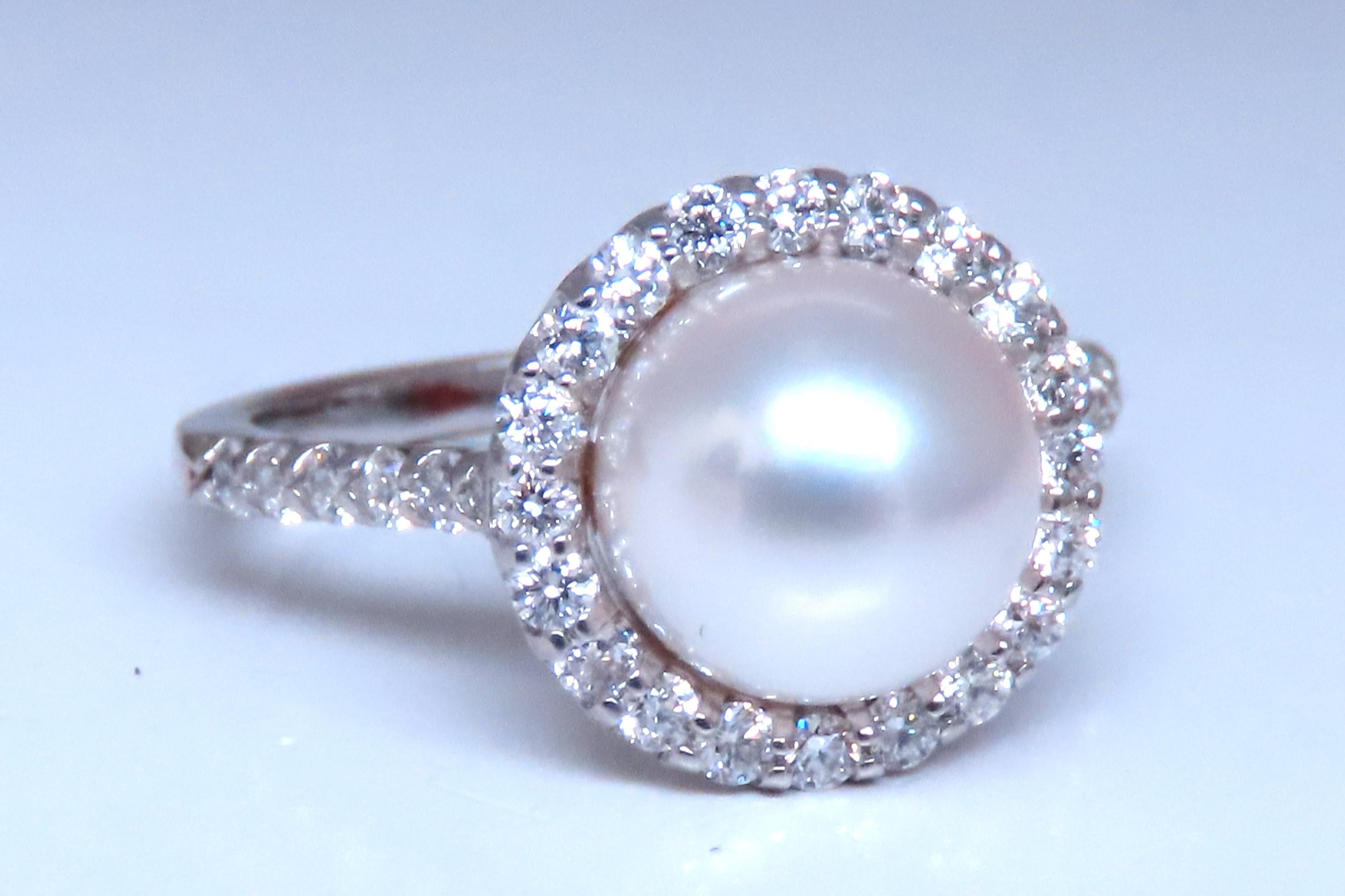 Natural Diamonds Pearl Ring
9mm South Sea White pearl
.76ct Diamonds
G-color Vs-2 clarity
14kt white gold
4.7 grams
12mm wide
10mm depth
Size 7
$4000 Appraisal to accompany