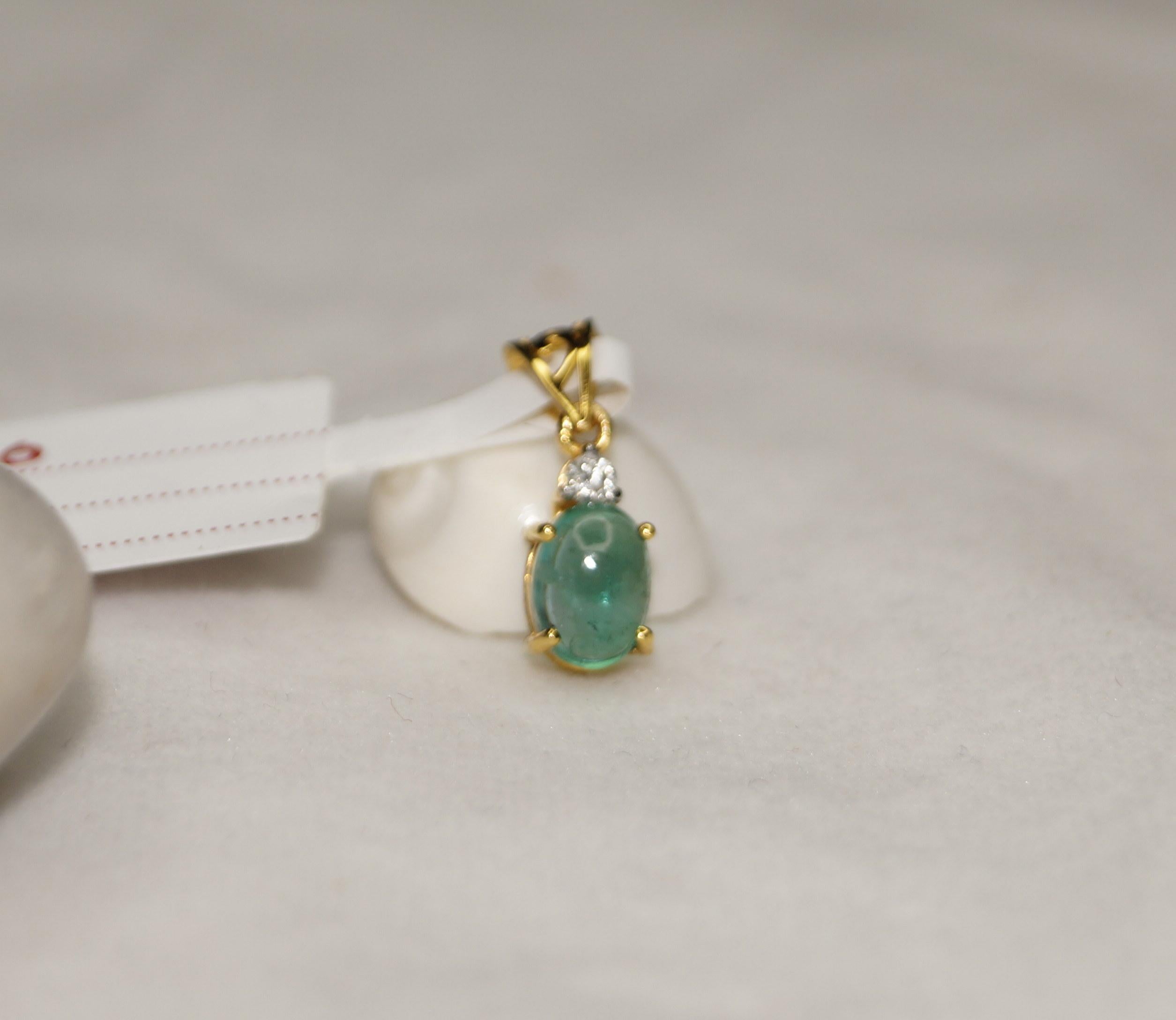 This Stunner Pendant defines class. This piece of beauty comprises of Natural Zambian cabochon Emerald studded in 18K Yellow Gold with excellent diamonds to add into the fire. 
Details are here below:
Item No- E110

Metal- Yellow Gold
Metal purity-