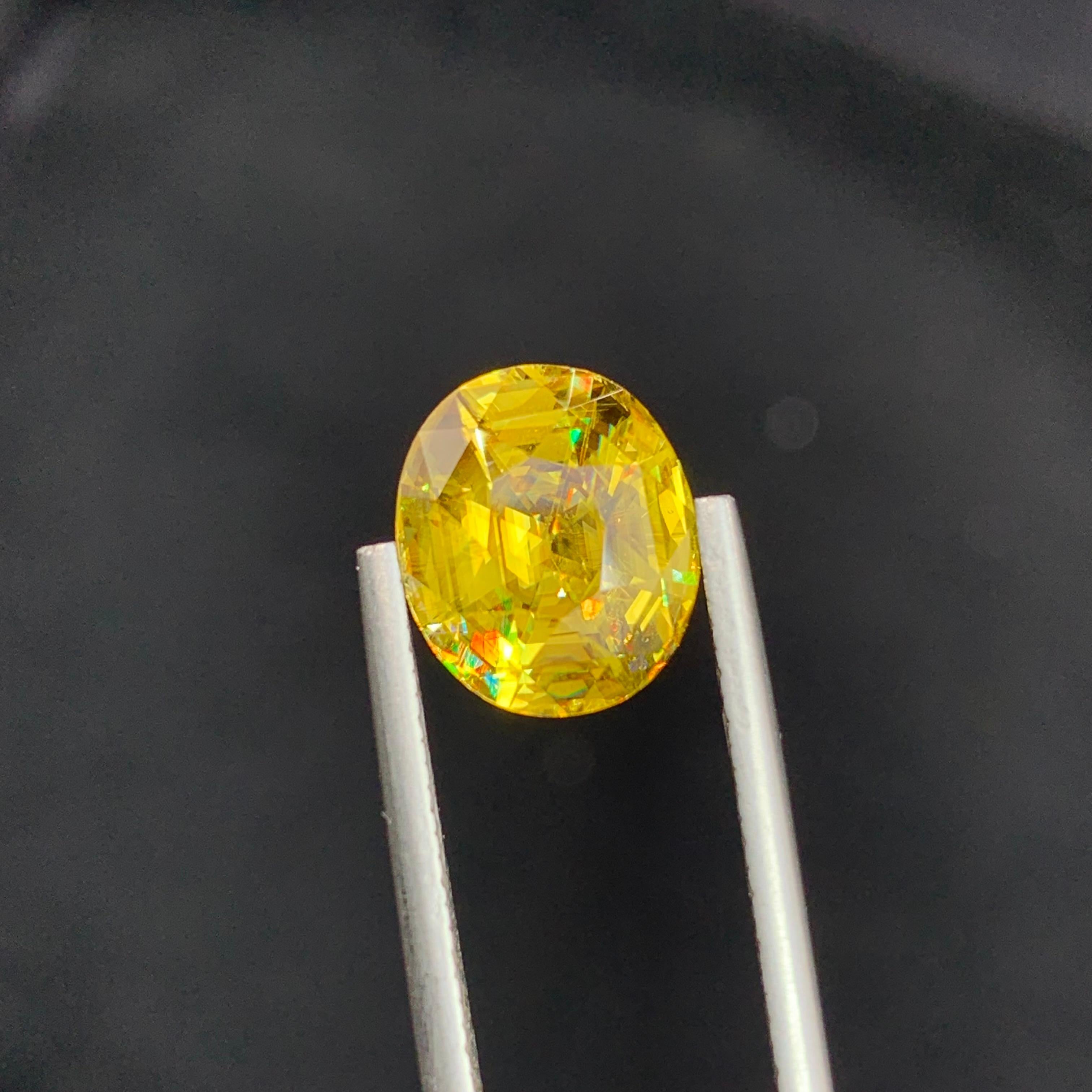 Natural AAA Top Quality Fire Sphene 4.90 Carat Titanite Oval Shape Gem For Ring  In New Condition For Sale In Peshawar, PK