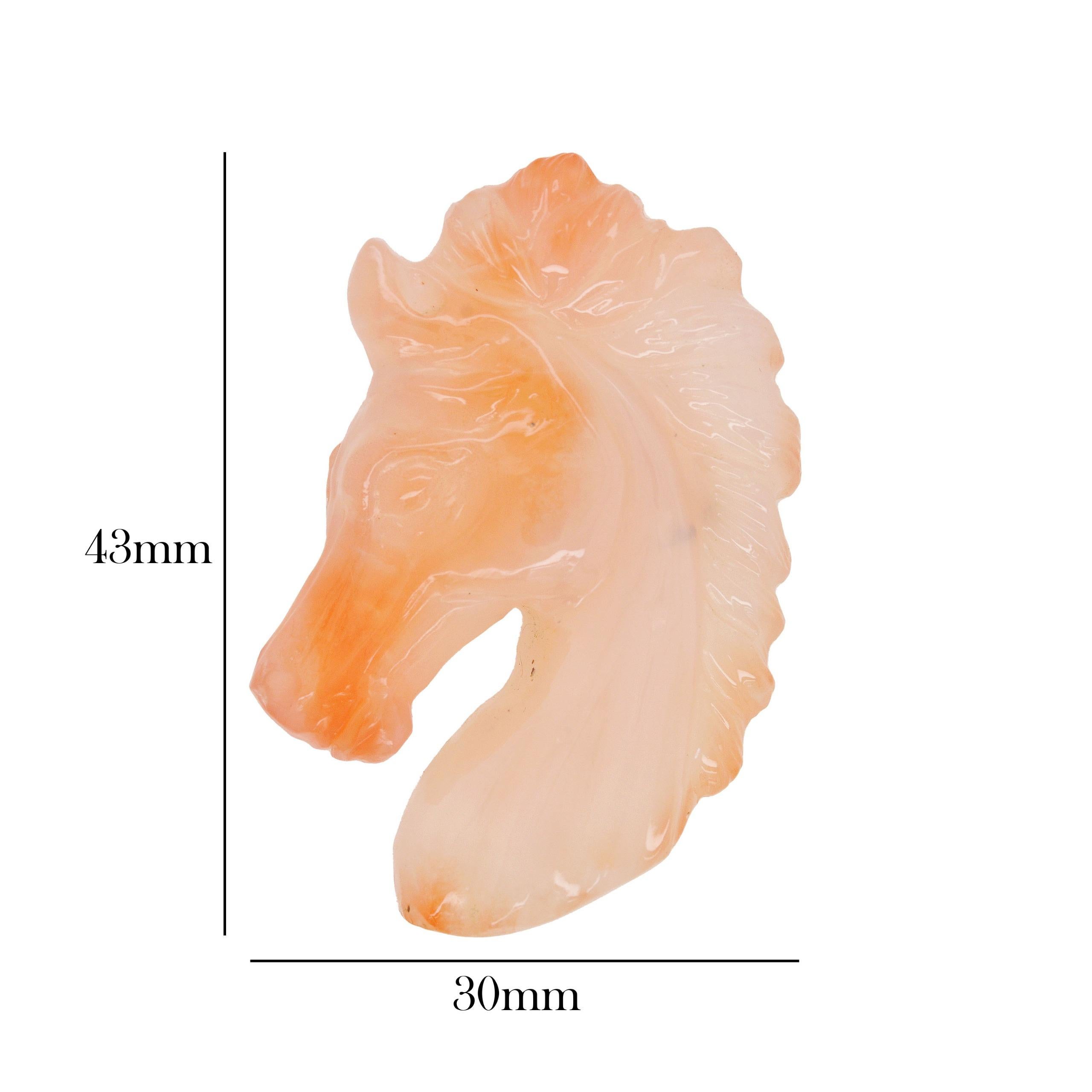 Stylish natural agate chalcedony horse face carving loose gemstone for pendant brooch.

The agate horse carving is a stunning representation of elegance and strength, featuring a beautifully detailed horse face crafted from slightly orange - peach