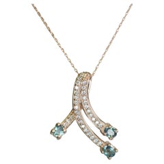 Collana in oro rosa con alessandrite naturale e diamanti