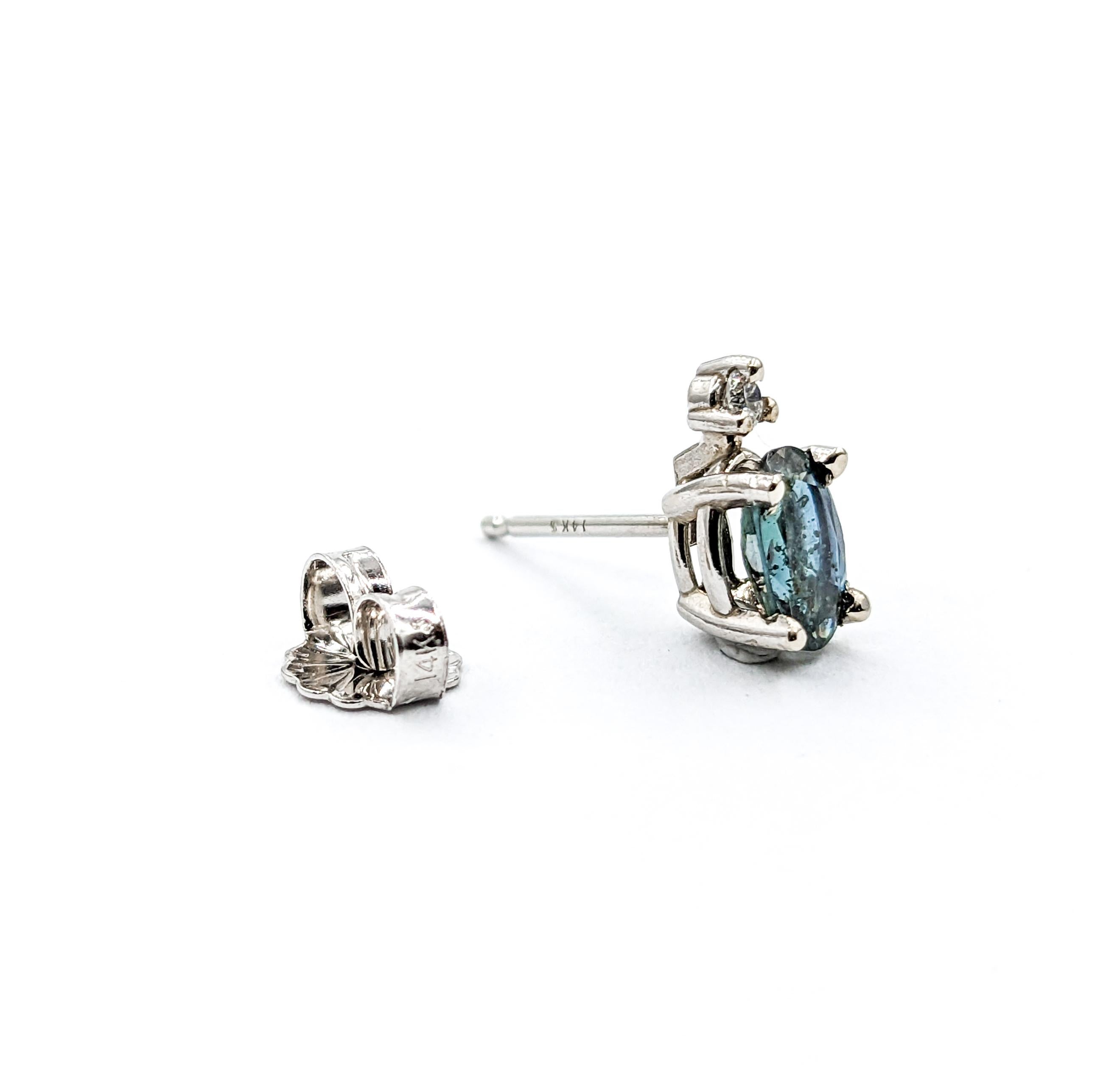 Natural Alexandrite & Diamond Stud Earrings In White Gold

Introducing our exquisite Natural Alexandrite earrings in 14k White Gold, a perfect blend of elegance and sophistication. These earrings showcase stunning 1.30ctw Alexandrite gemstones. The